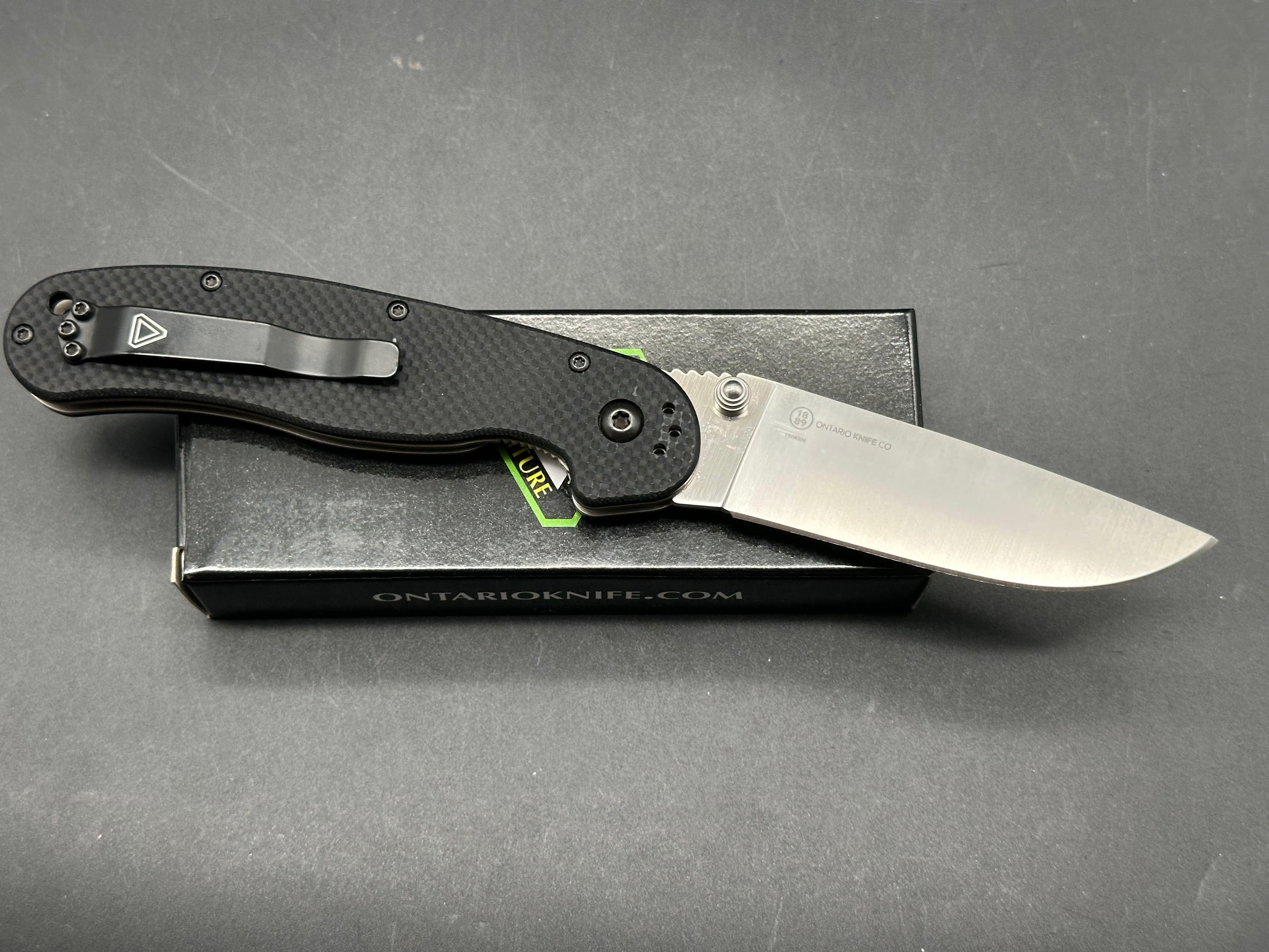 Ontario Rat 1.5 3.25" CPM MagnaCut Satin Blade with Black Textured G10 Scales