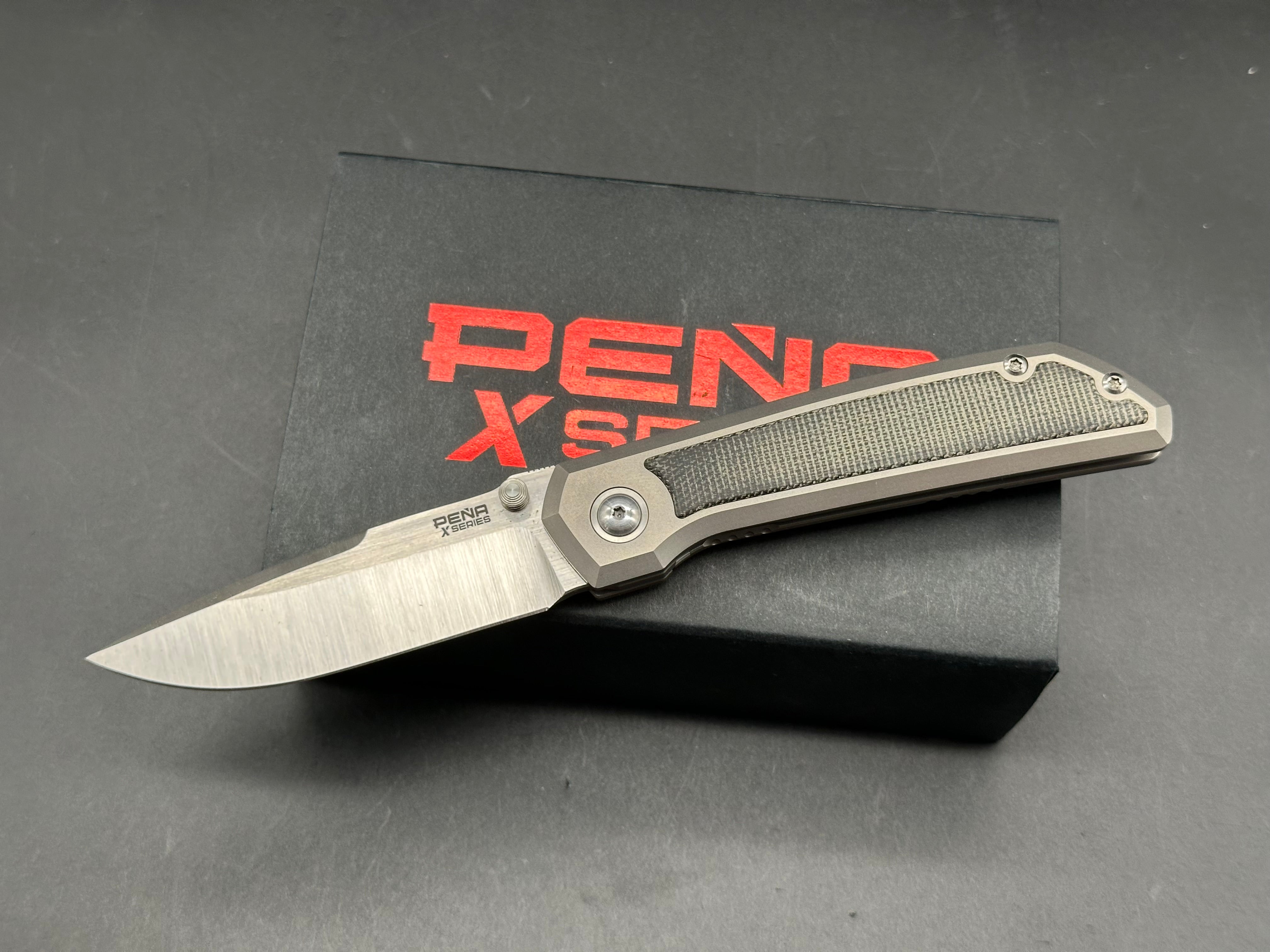 Pena X-Series Mula Drop Point, Belt Satin M390 Blade, Titanium Handles with Black Micarta Inlays