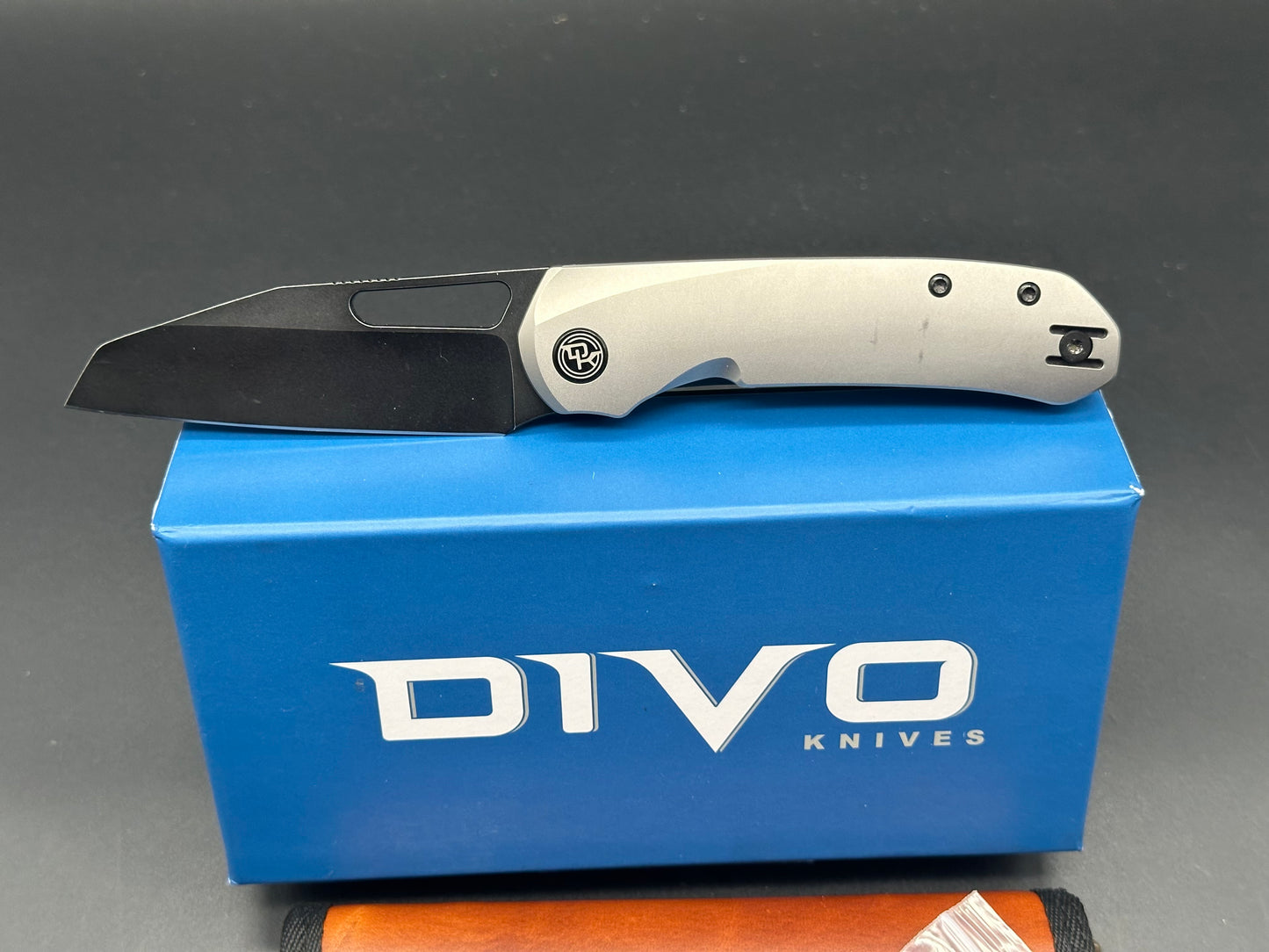 Divo knives Buzz reverse tux bead blasted titanium w/ black washed 20cv w/ zircuti back spacer and Skiff bearings