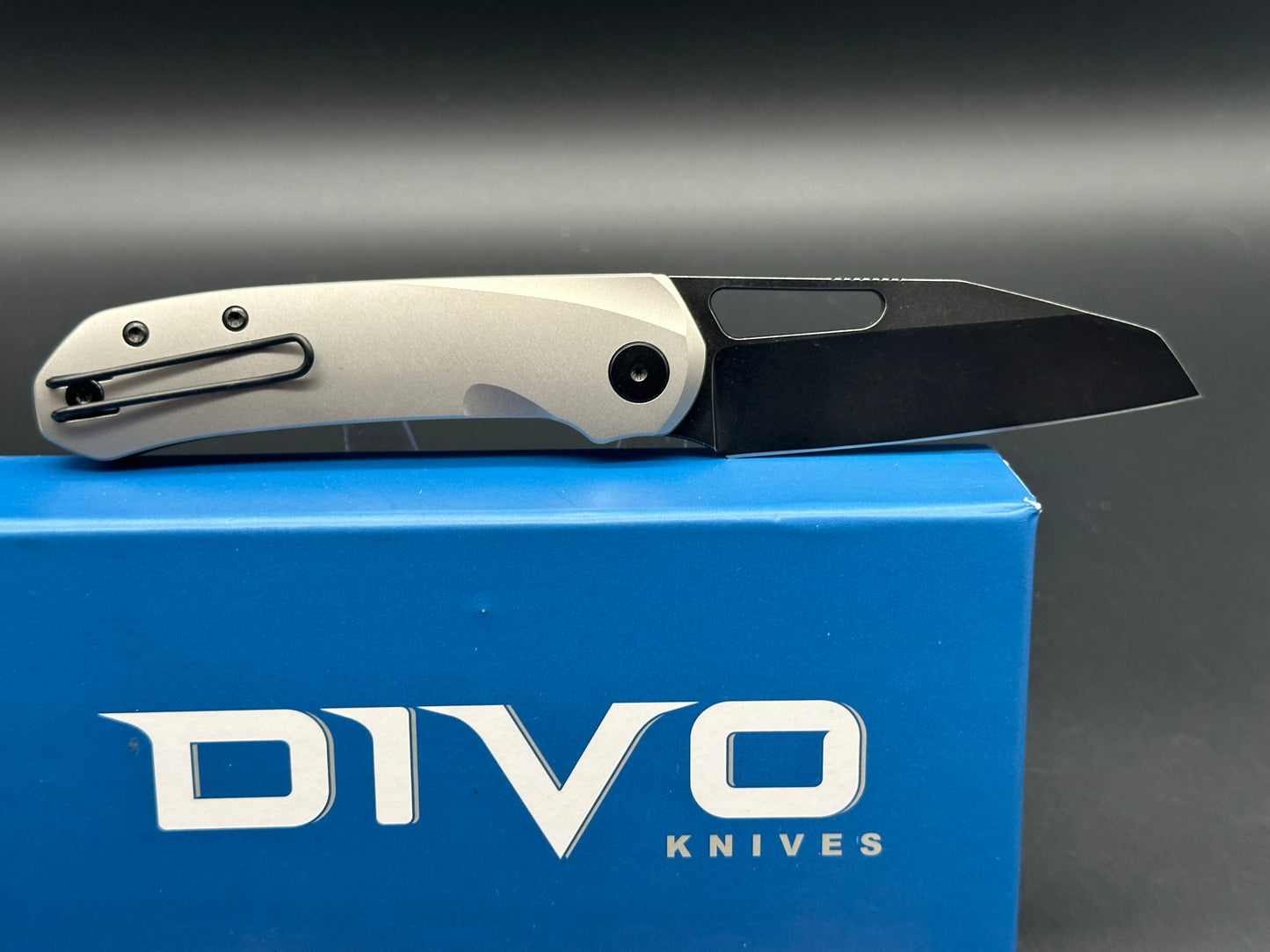 Divo knives Buzz reverse tux bead blasted titanium w/ black washed 20cv w/ zircuti back spacer and Skiff bearings