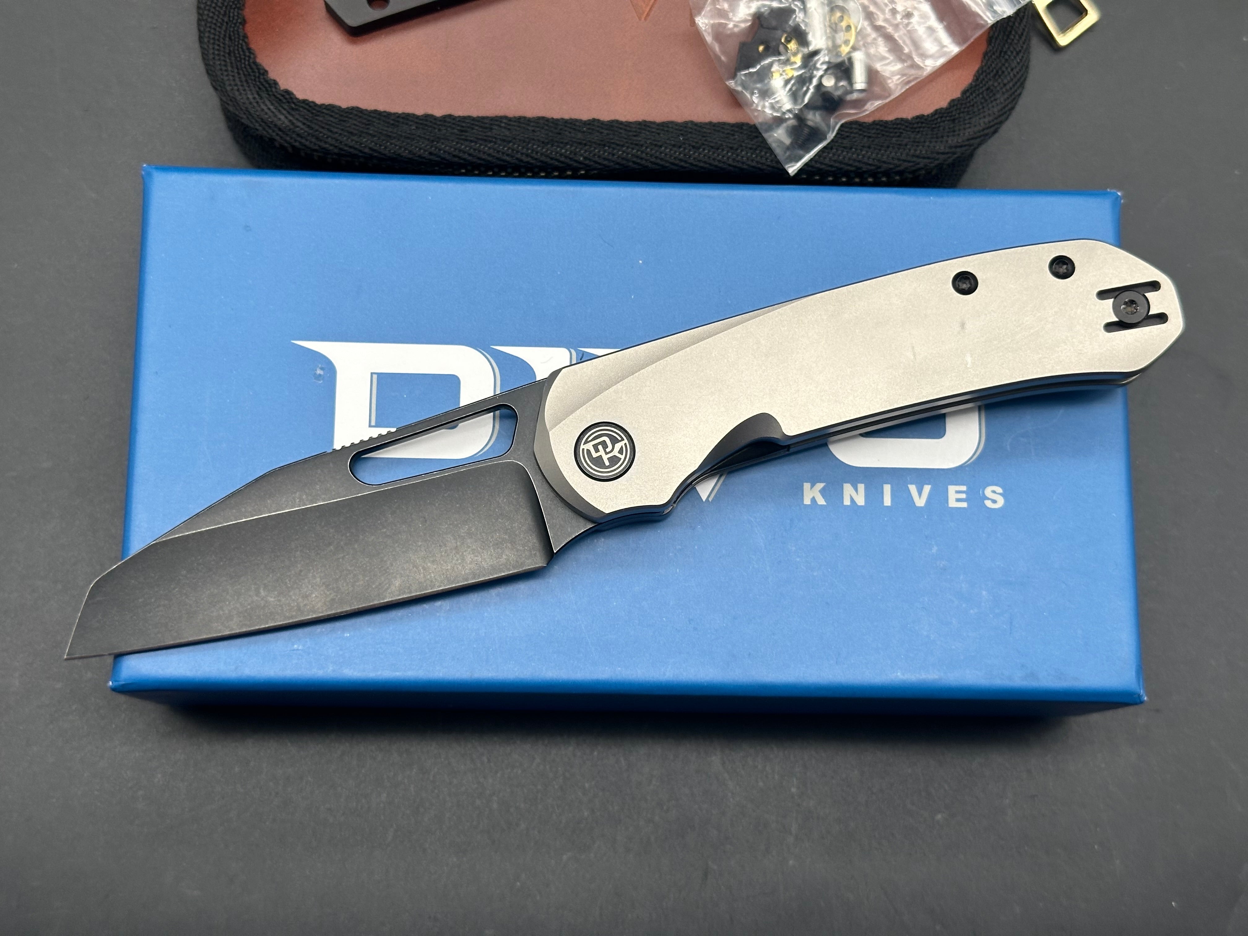 Divo knives Buzz reverse tux bead blasted titanium w/ black washed 20cv w/ zircuti back spacer and Skiff bearings