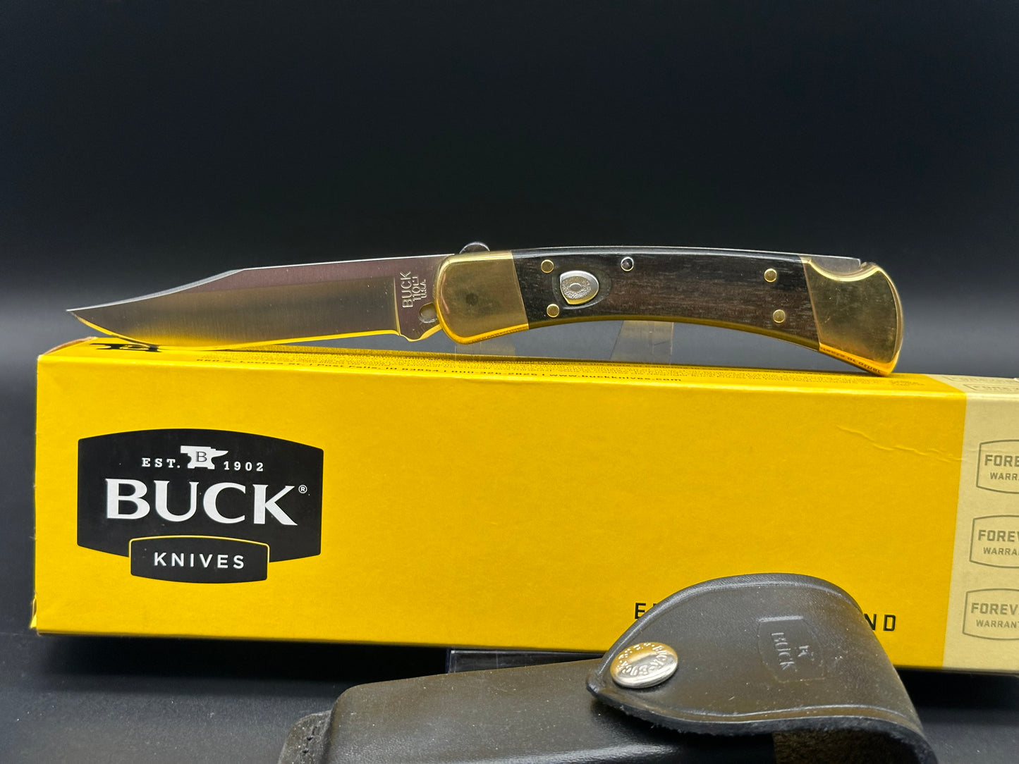 Buck 110 Automatic Ebony/Brass, 420HC Steel, w/Sheath