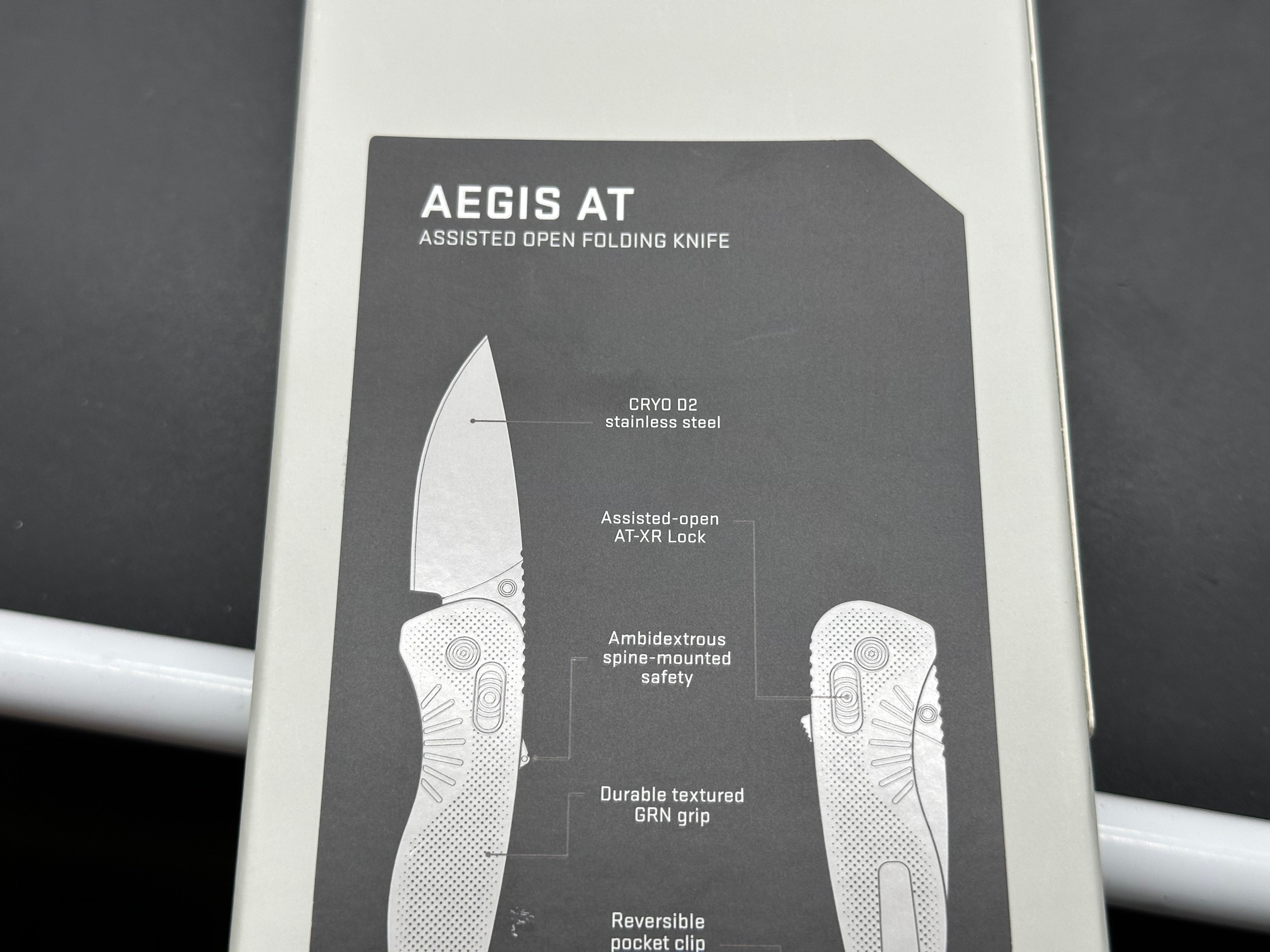 SOG Aegis AT Blaze and Tan Assisted Folding Knife 3.13" D2 Black Plain Blade, Orange GRN Handles