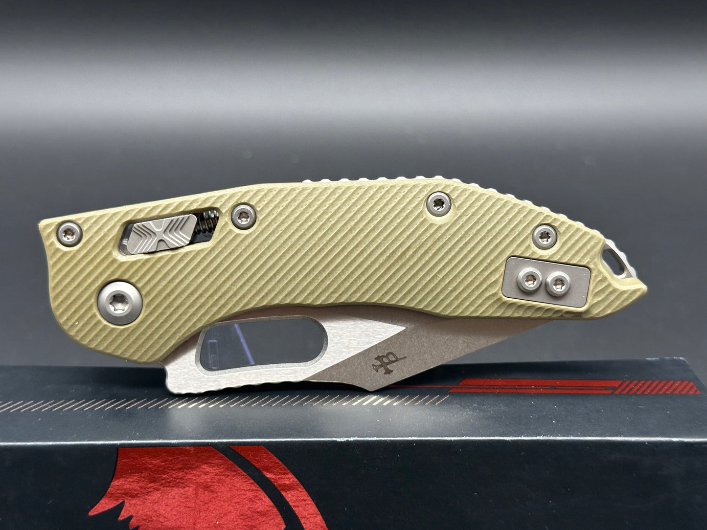 Microtech Stitch RAM-LOK 3.75” M390MK Stonewash Blade with a Fluted G10 handle in OD Green