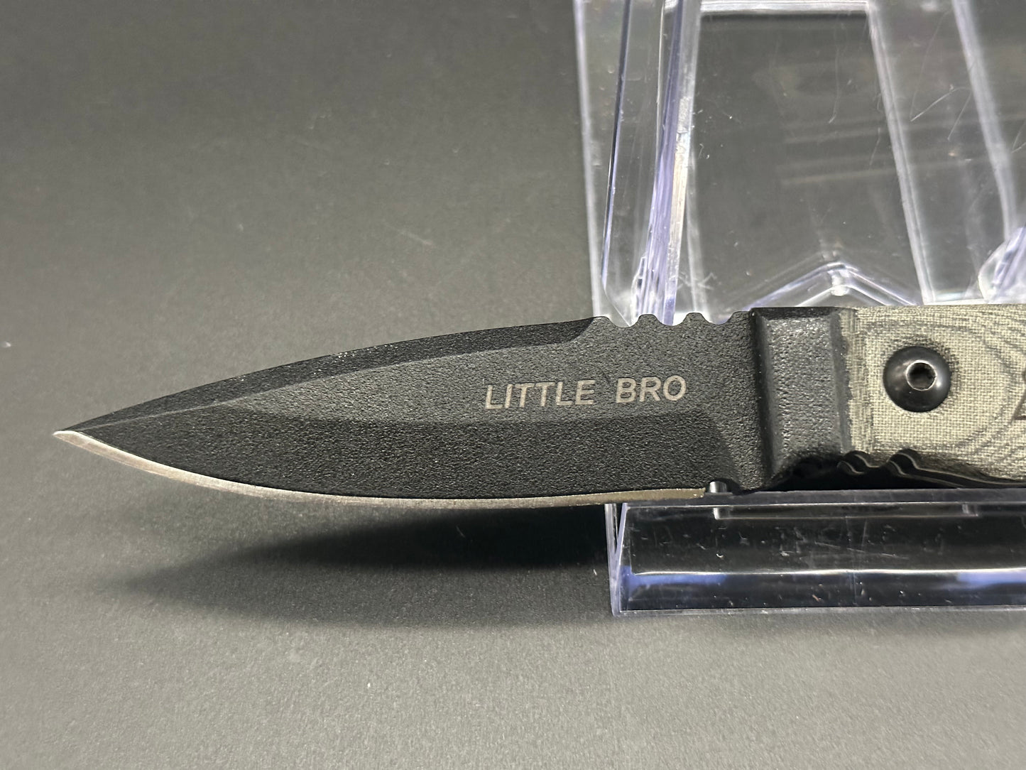 Tops Little Bro fixed blade linen micarta scales w/black 1095 blade (includessheath but no box)  $85