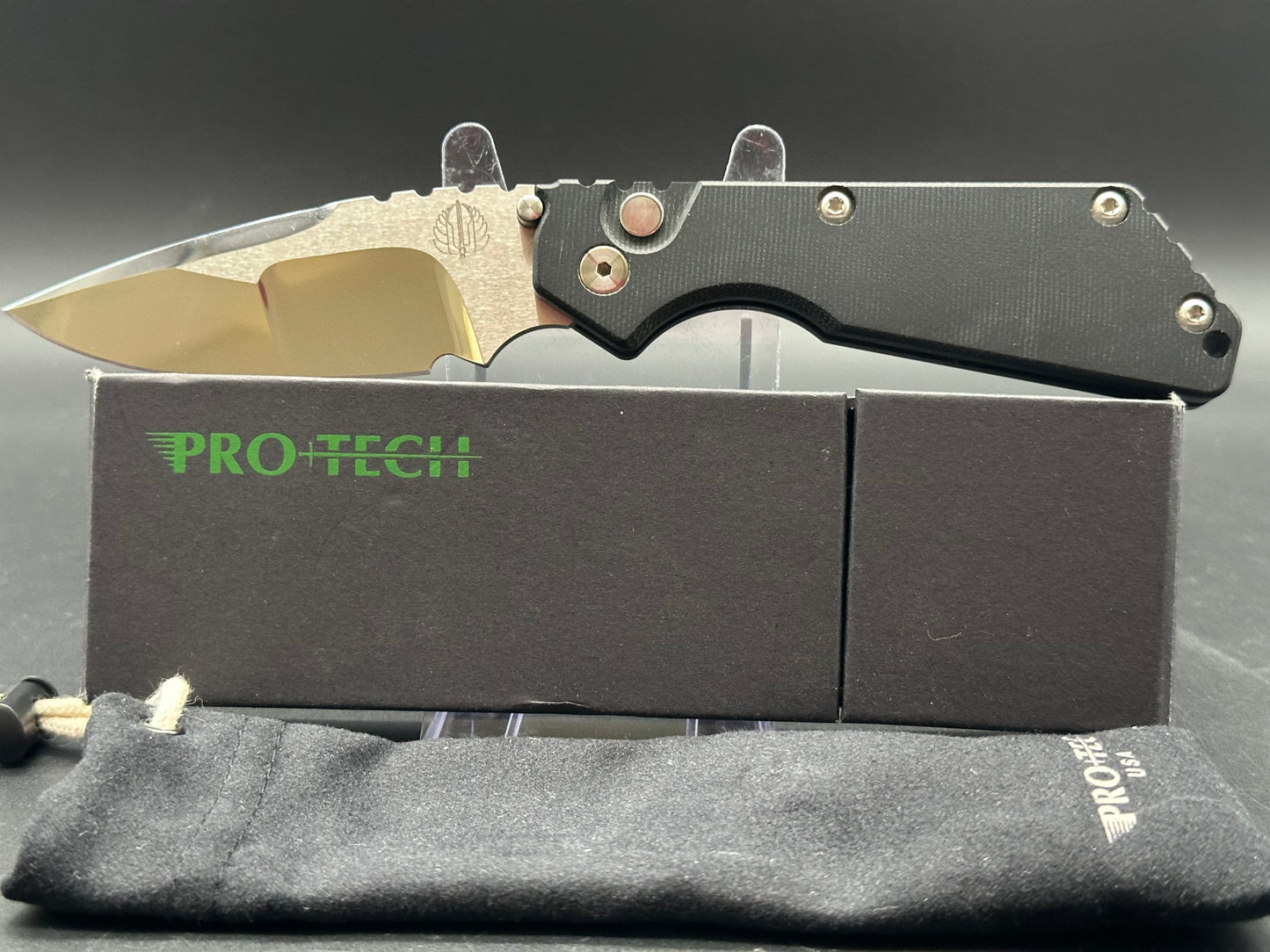 Protech Strider SNG black micarta/aluminum scales mirror polished compound grind 154CM blade / mother of pearl button