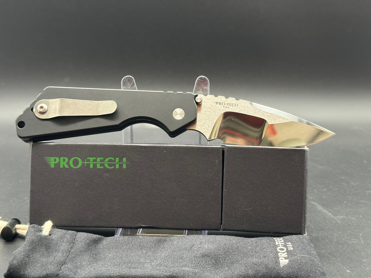 Protech Strider SNG black micarta/aluminum scales mirror polished compound grind 154CM blade / mother of pearl button