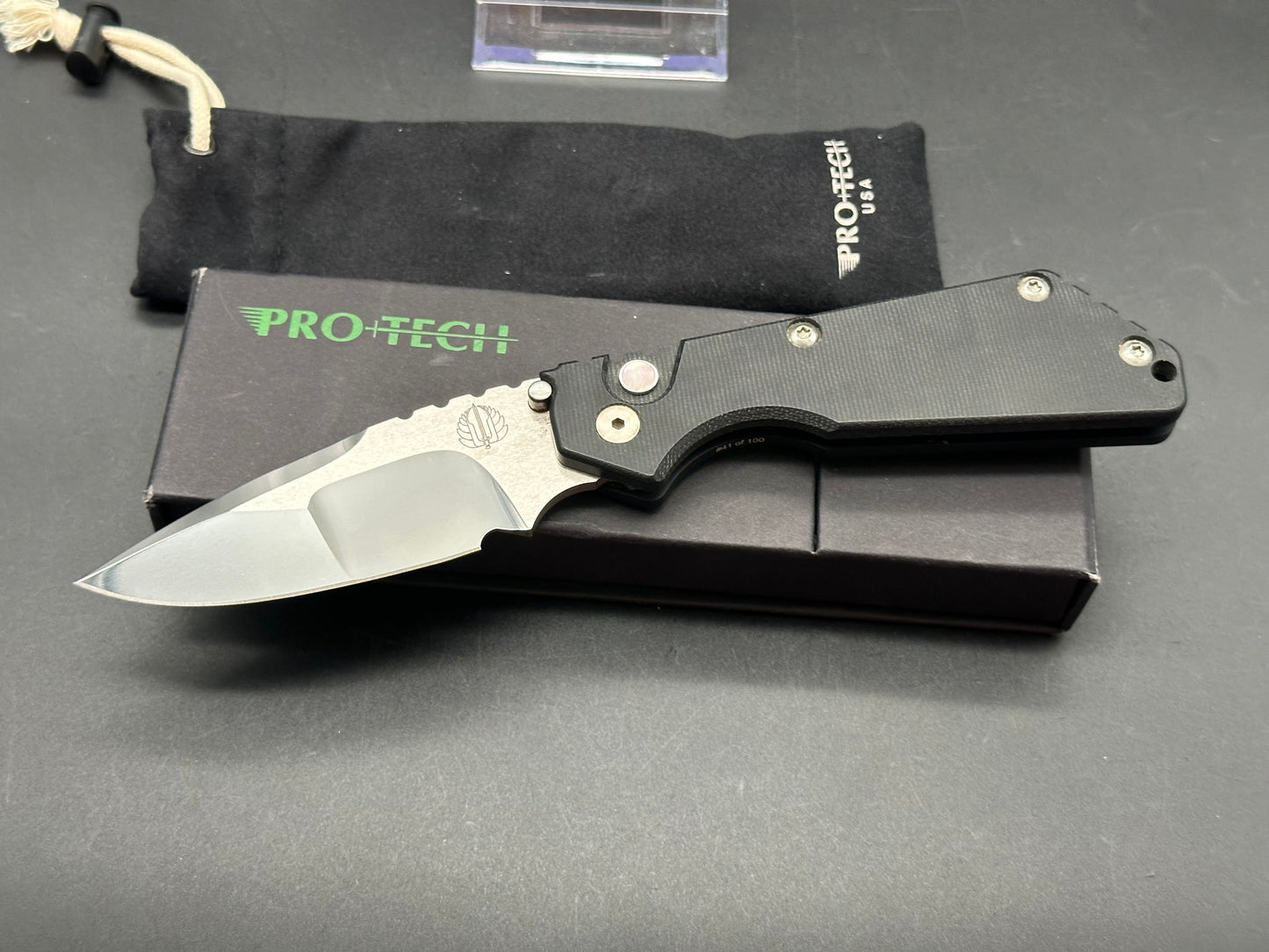 Protech Strider SNG black micarta/aluminum scales mirror polished compound grind 154CM blade / mother of pearl button