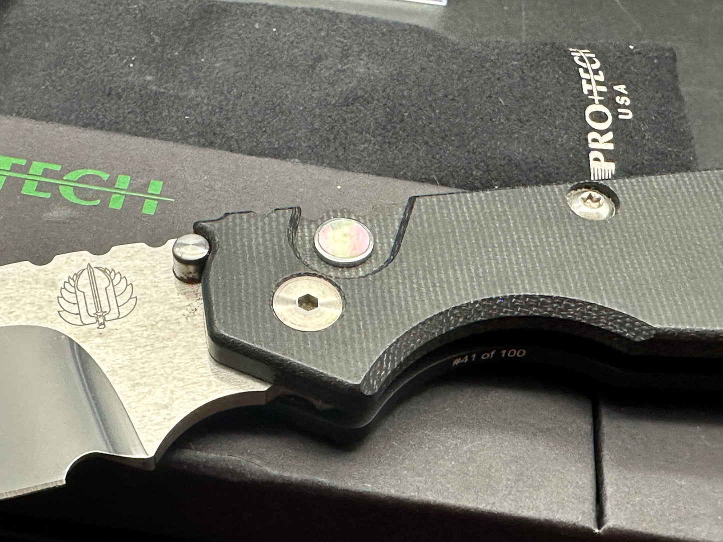 Protech Strider SNG black micarta/aluminum scales mirror polished compound grind 154CM blade / mother of pearl button