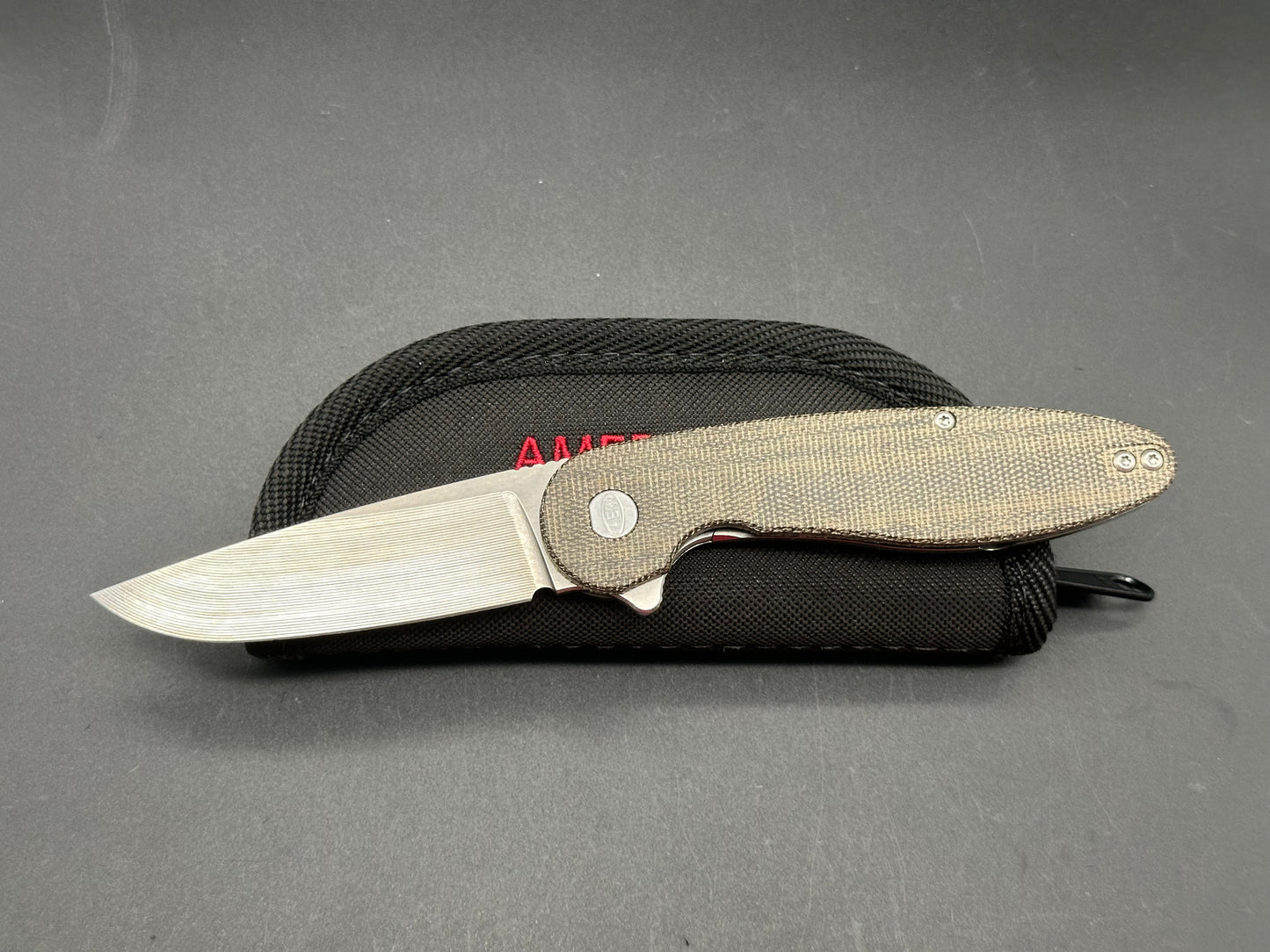 American Blade Works Model 1 micarta/titanium frame lock w/20CV blade