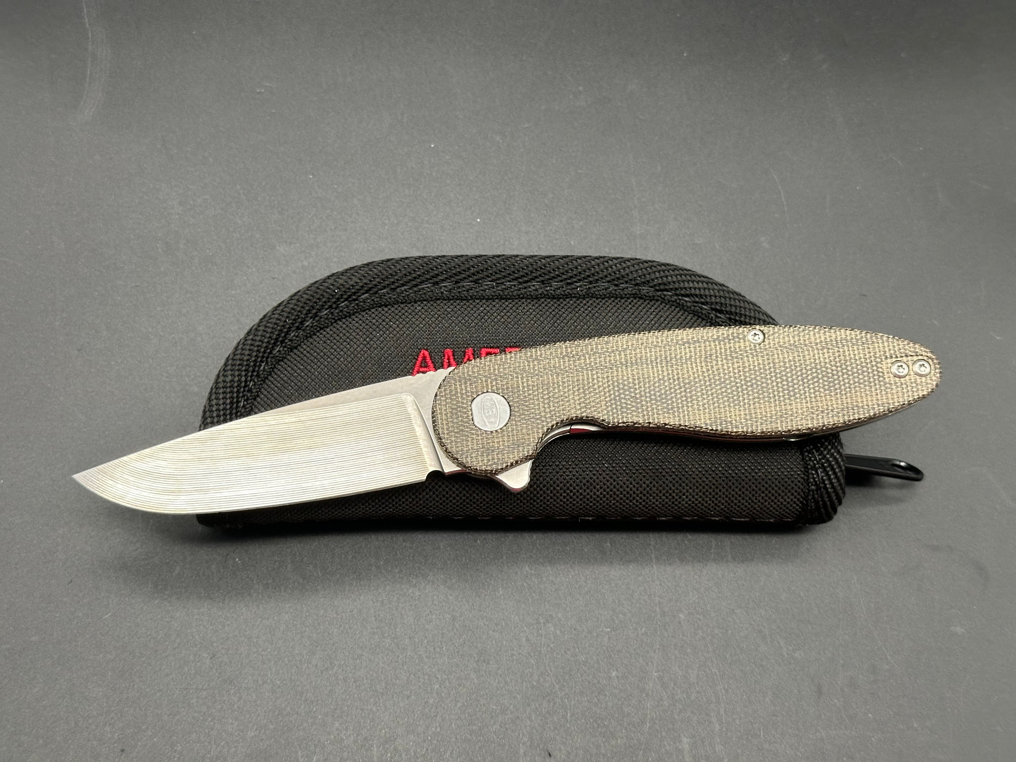 American Blade Works Model 1 micarta/titanium frame lock w/20CV blade