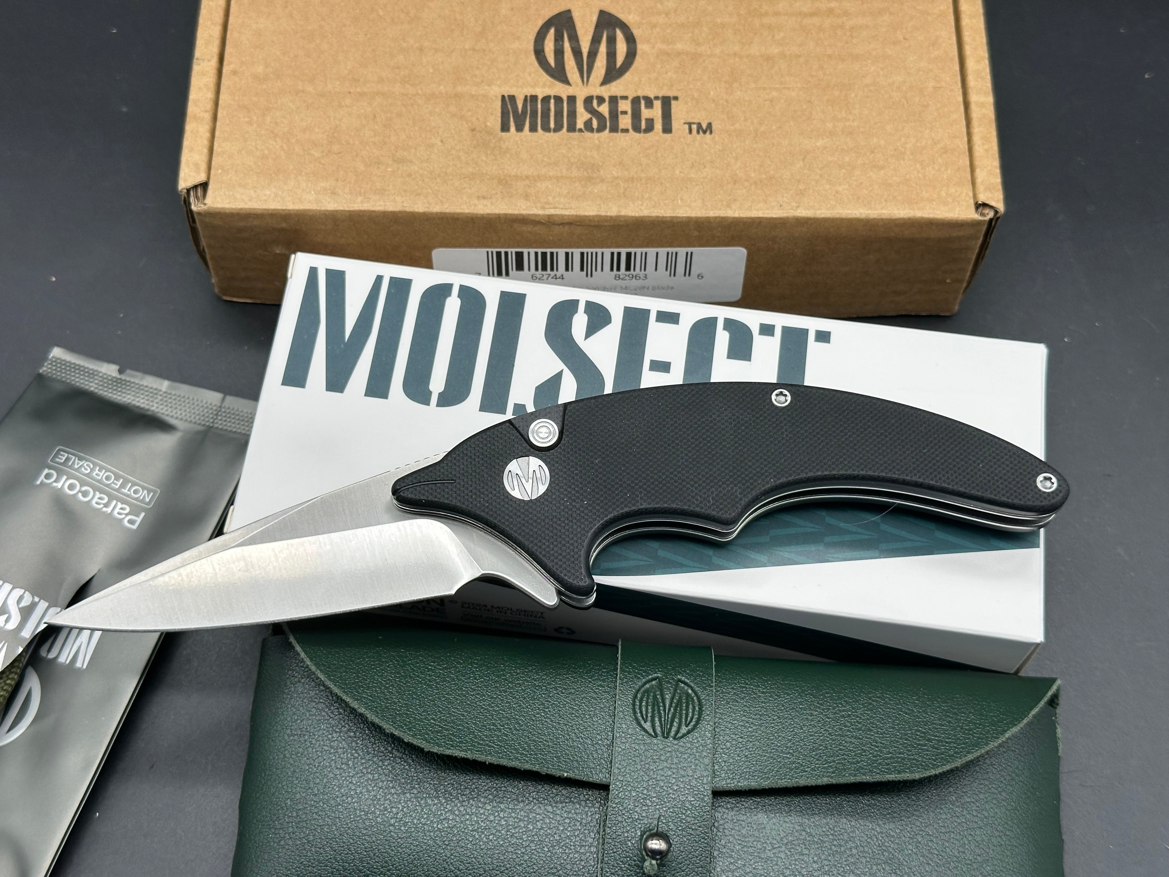 Molsect Cove black G10 handle w/ 14C28N blade