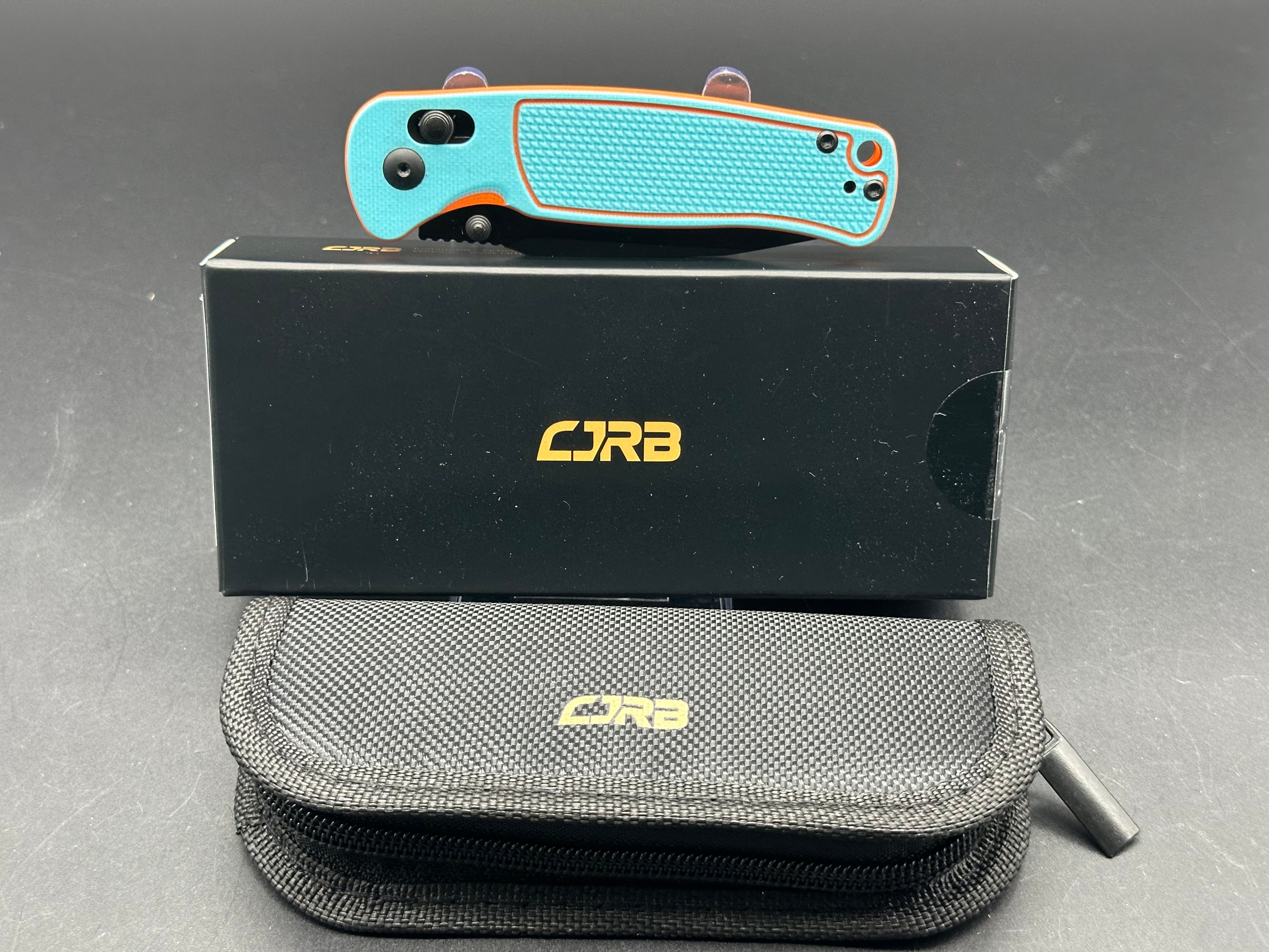 CJRB SHALE FOLDING KNIFE BLUE/ORANGE G10 BLACK PVD AR-RMP9 BLADE