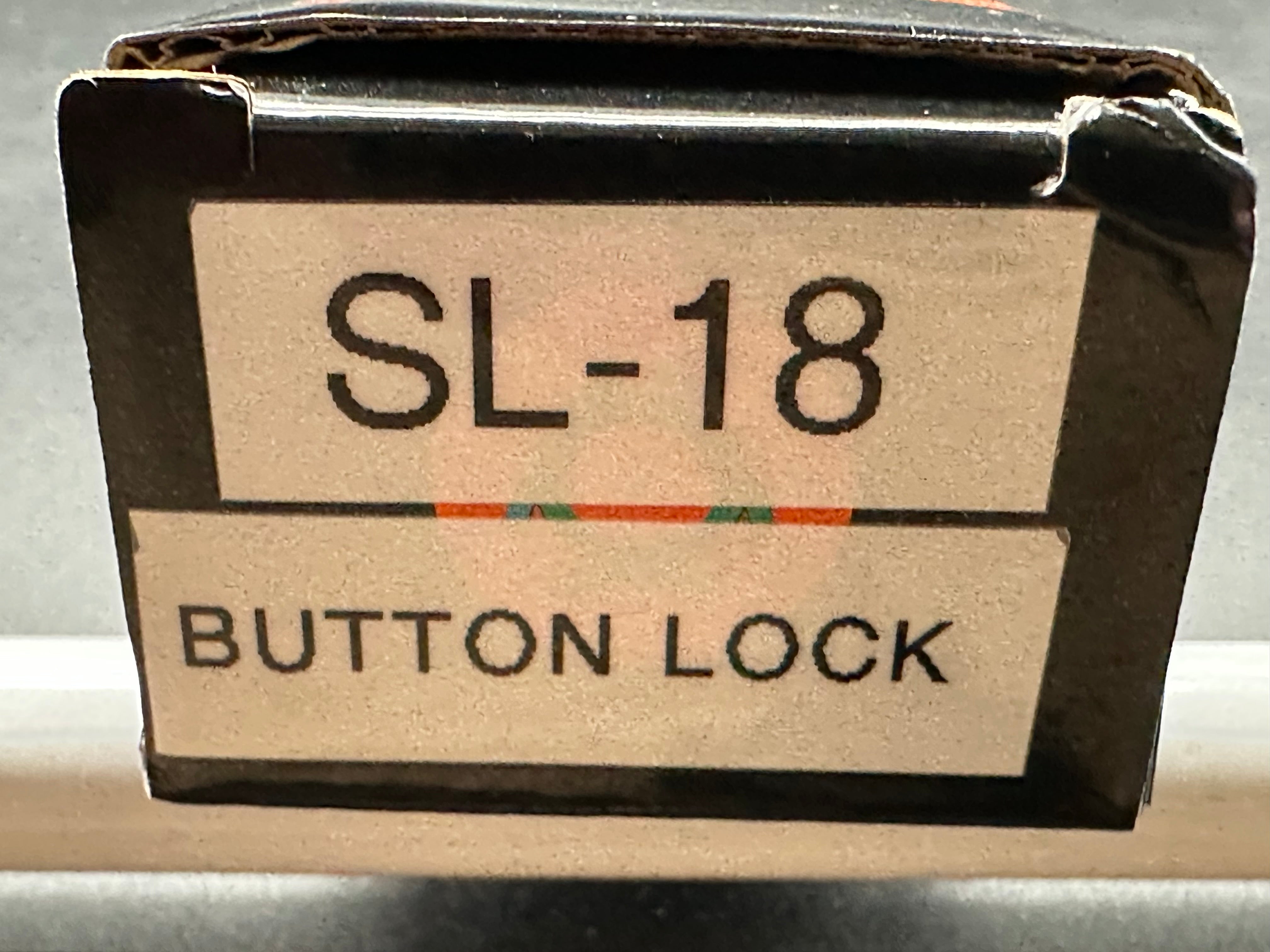 Sixleaf SL-18 Rattlesnake design, button lock, micarta scales, D2 blade