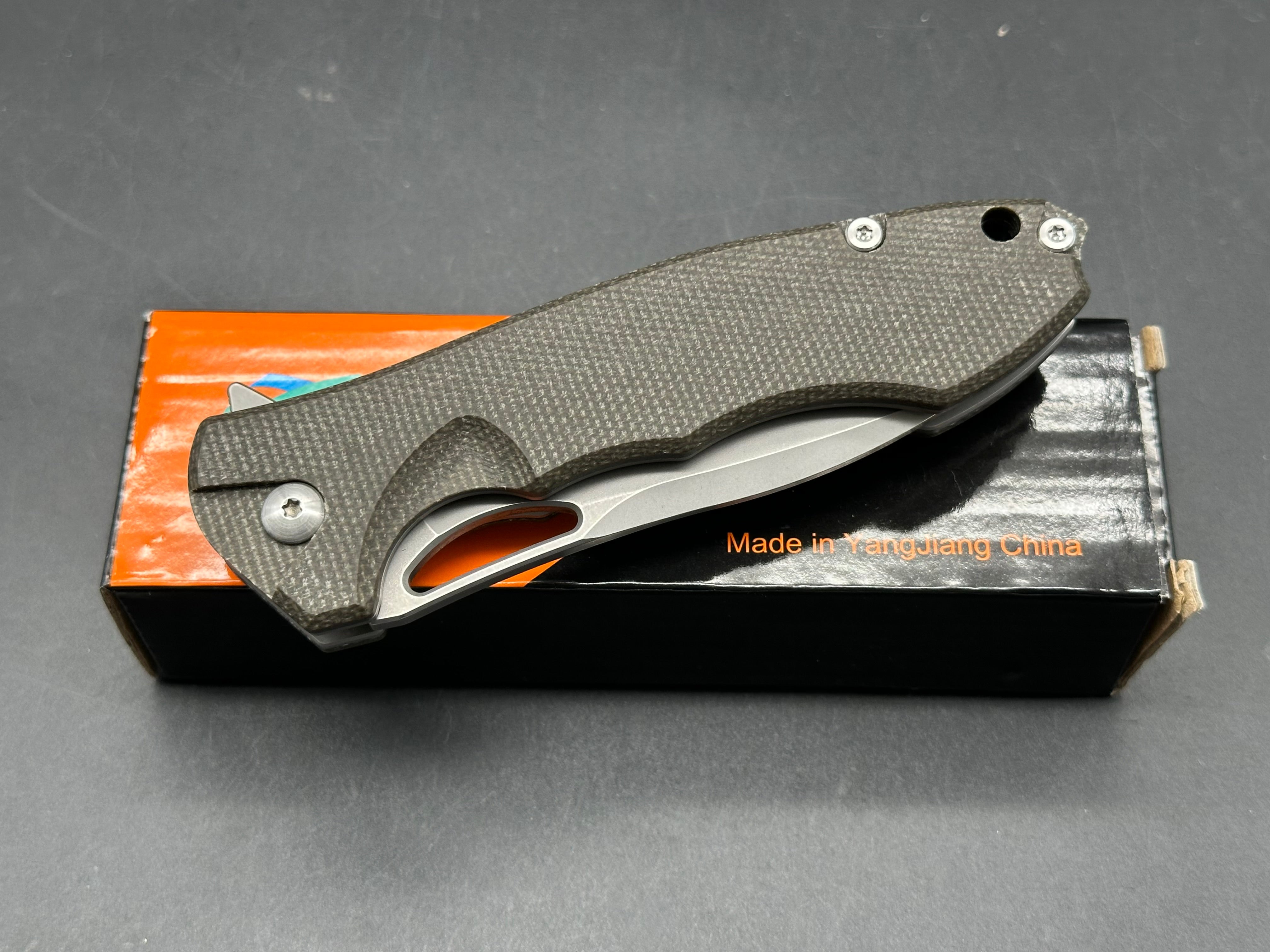 Sixleaf SL-20  Rattlesnake design, liner lock, micarta scales, D2 blade
