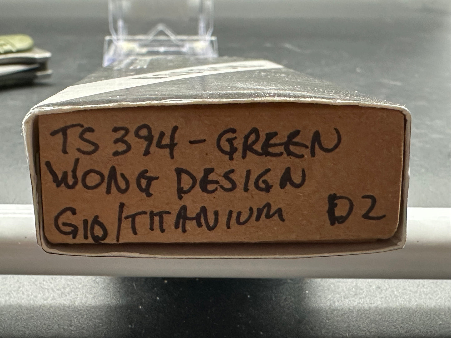 TS394 Wong design, green G10 scales, titanium liners, D2 blade