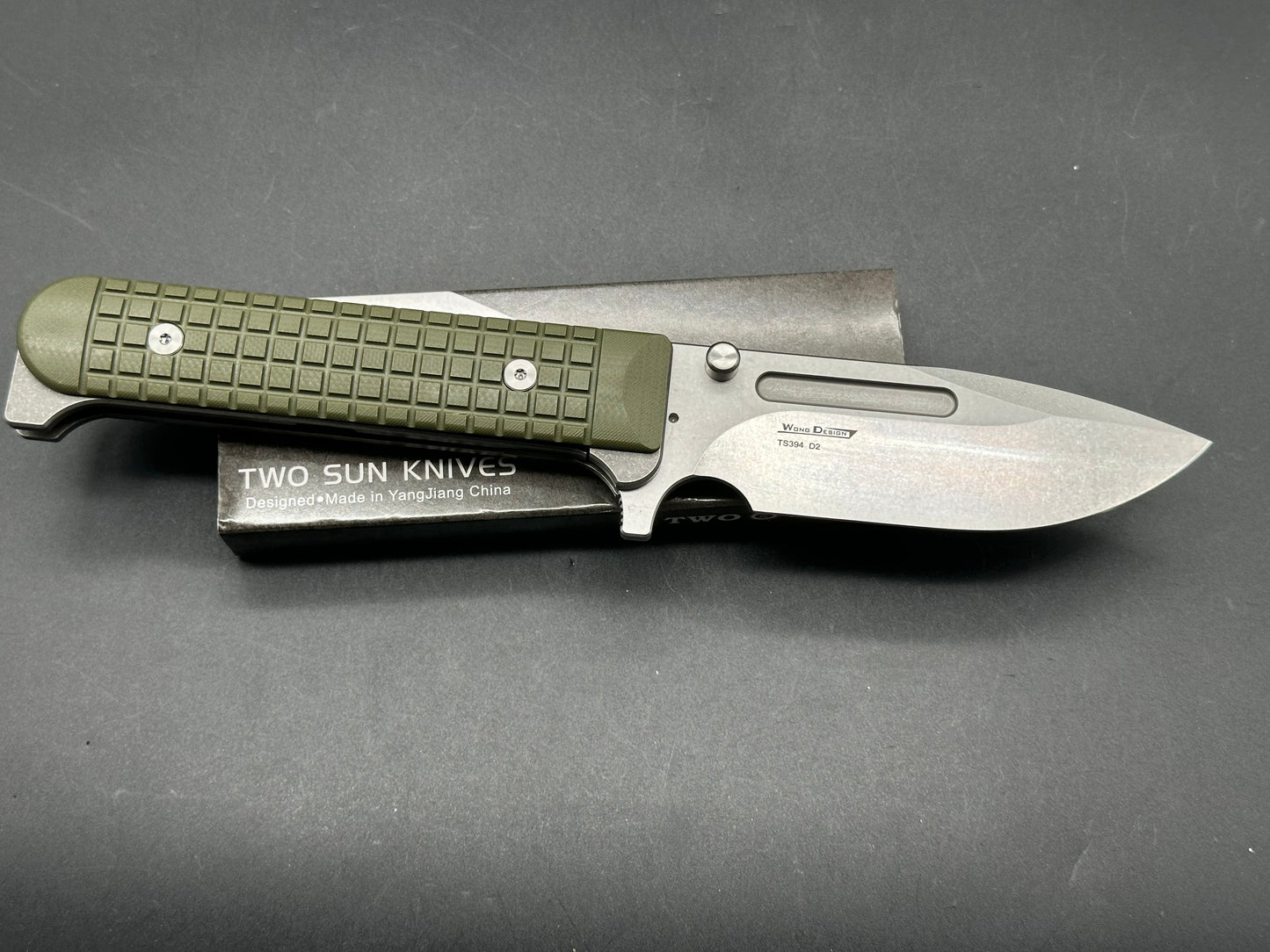 TS394 Wong design, green G10 scales, titanium liners, D2 blade