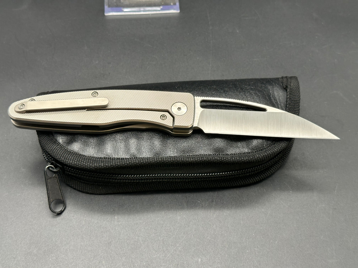 PKW Wharnetac CPM20cv hollow grind titanium handle