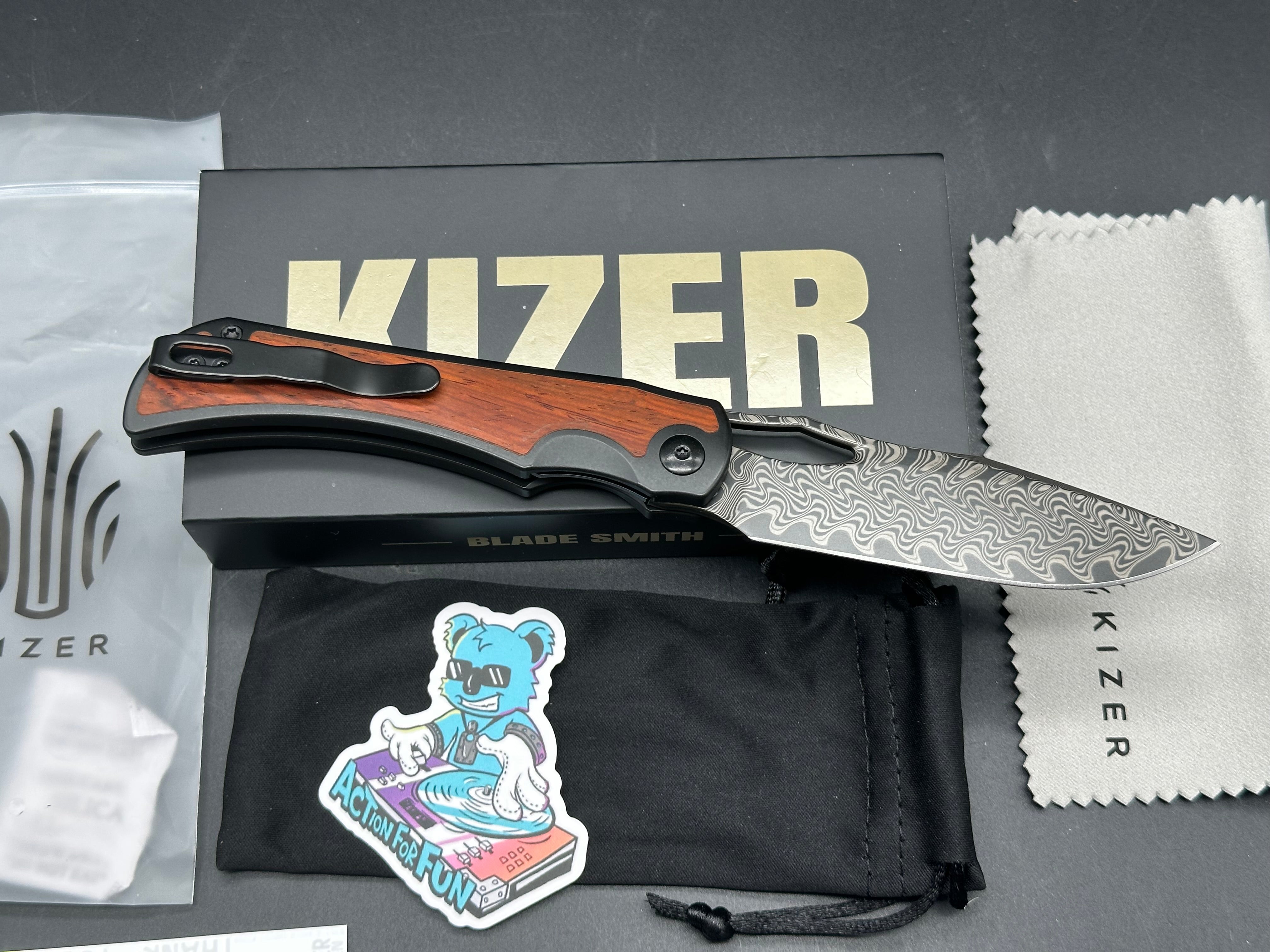 KIZER ALLURE FOLDING KNIFE TITANIUM/PANAMA ROSEWOOD HANDLE DAMASCUS DROP POINT PLAIN EDGE ACID WASH FINISH