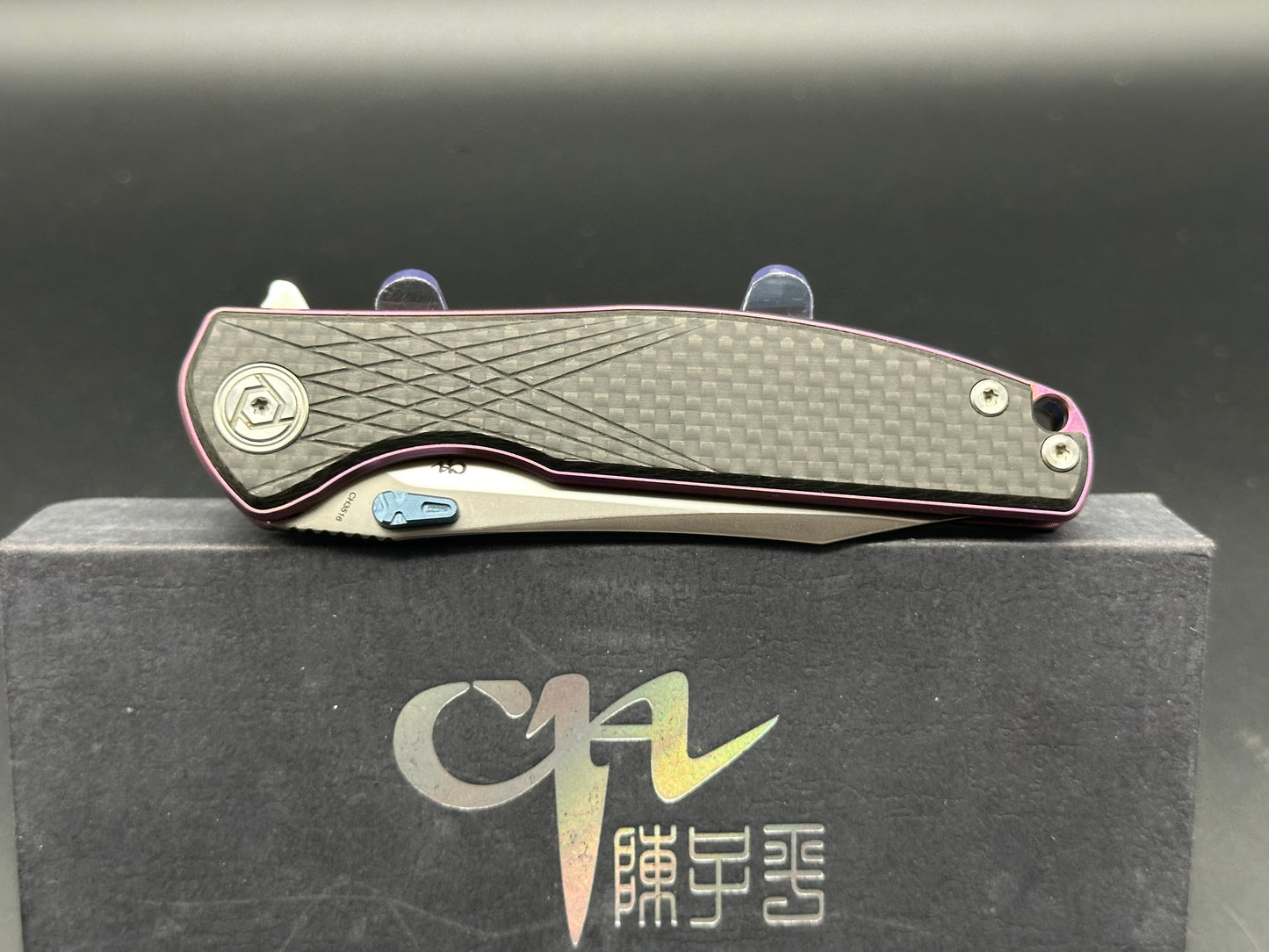 CH Knives "CH3516-1". S35vn, Purple TI Frame with CF Scales