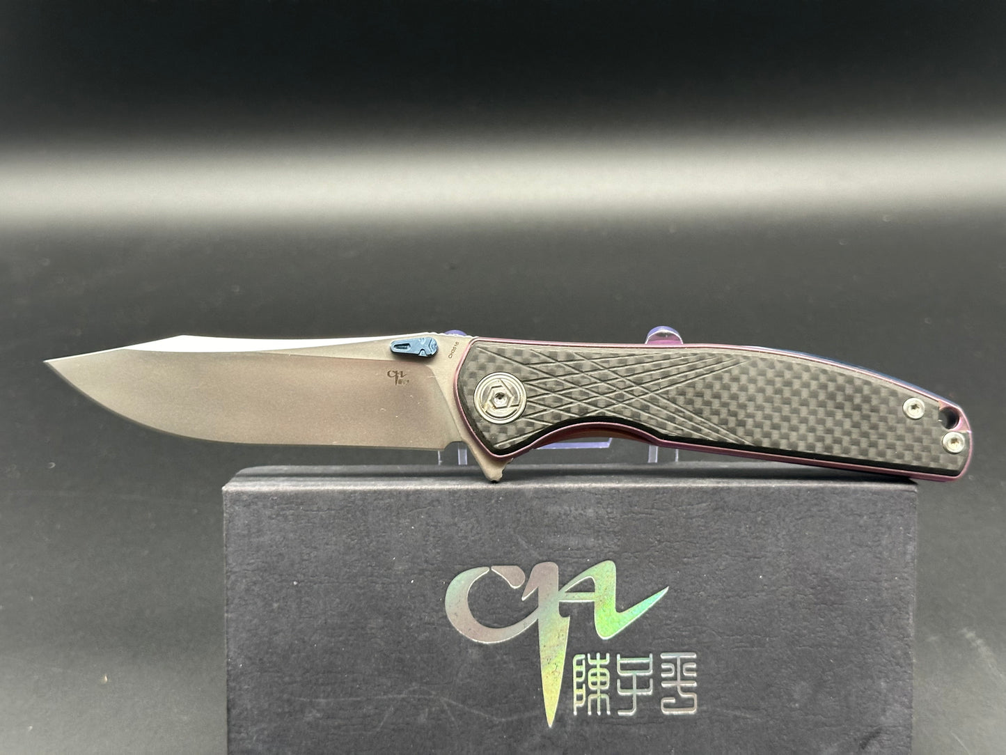 CH Knives "CH3516-1". S35vn, Purple TI Frame with CF Scales