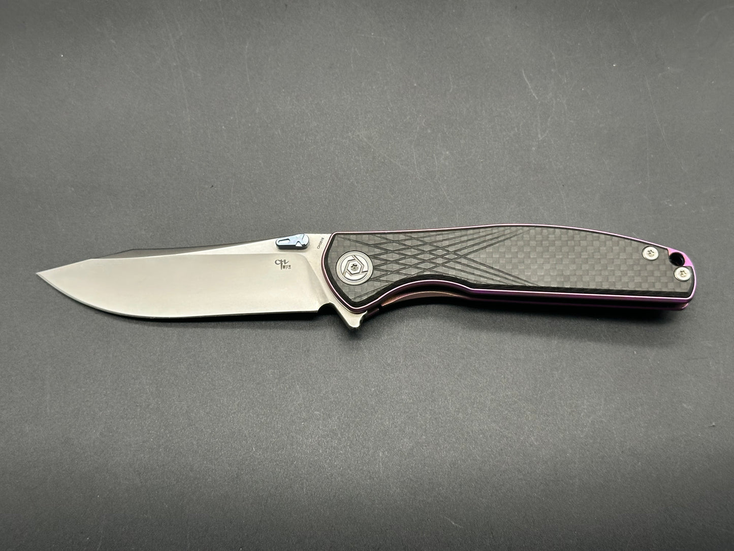 CH Knives "CH3516-1". S35vn, Purple TI Frame with CF Scales