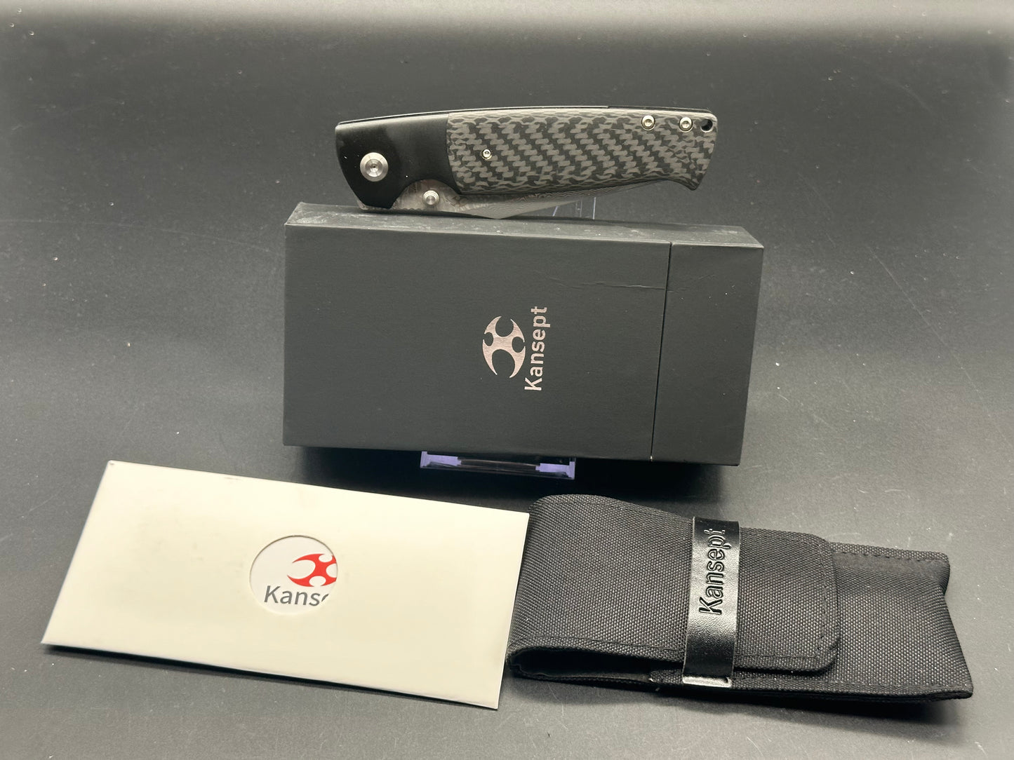 KANSEPT SHIKARI BLACK TITANIUM/TWILL CARBON FIBER INLAY DAMASCUS PLAIN EDGE