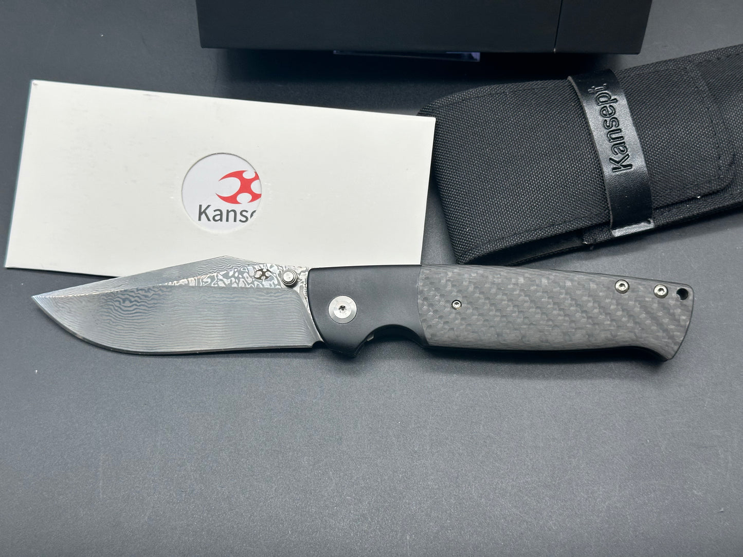 KANSEPT SHIKARI BLACK TITANIUM/TWILL CARBON FIBER INLAY DAMASCUS PLAIN EDGE