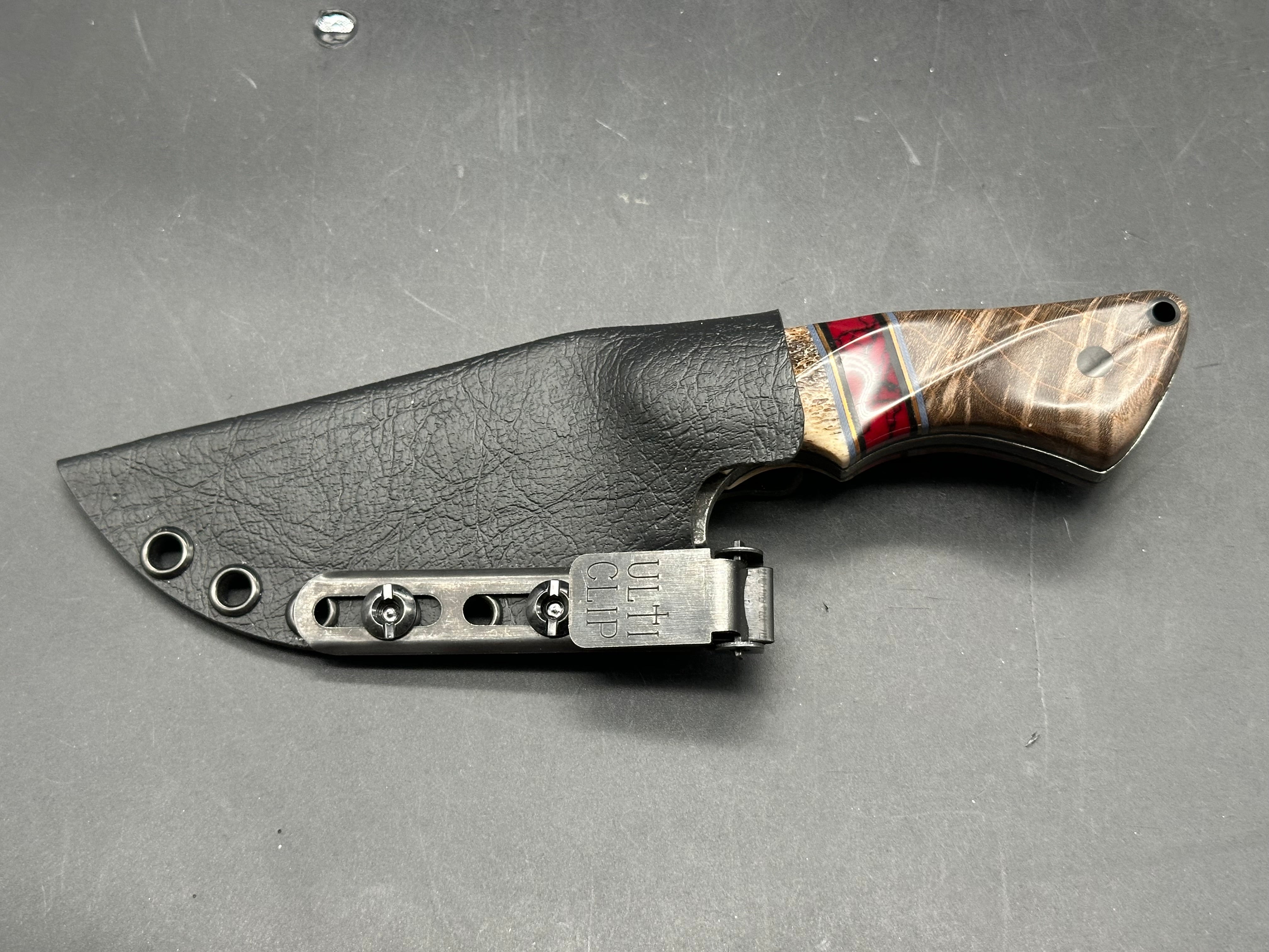 Waters Edge custom/ 7.25 inches overall length/1095 steel/handle is buffalo bone, blood jasper, and stabilized curly maple