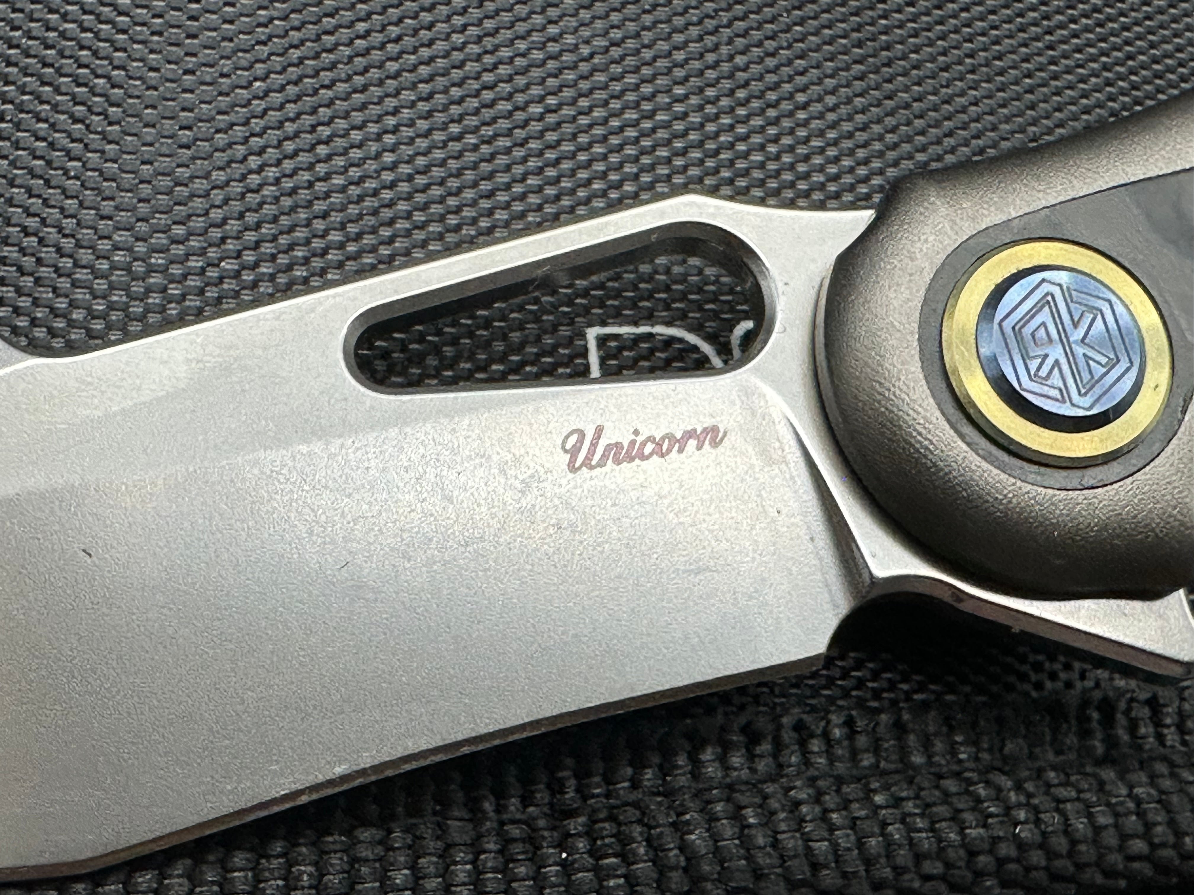 Rike Knives Unicorn, M390 blade, black/blue carbon fiber handle