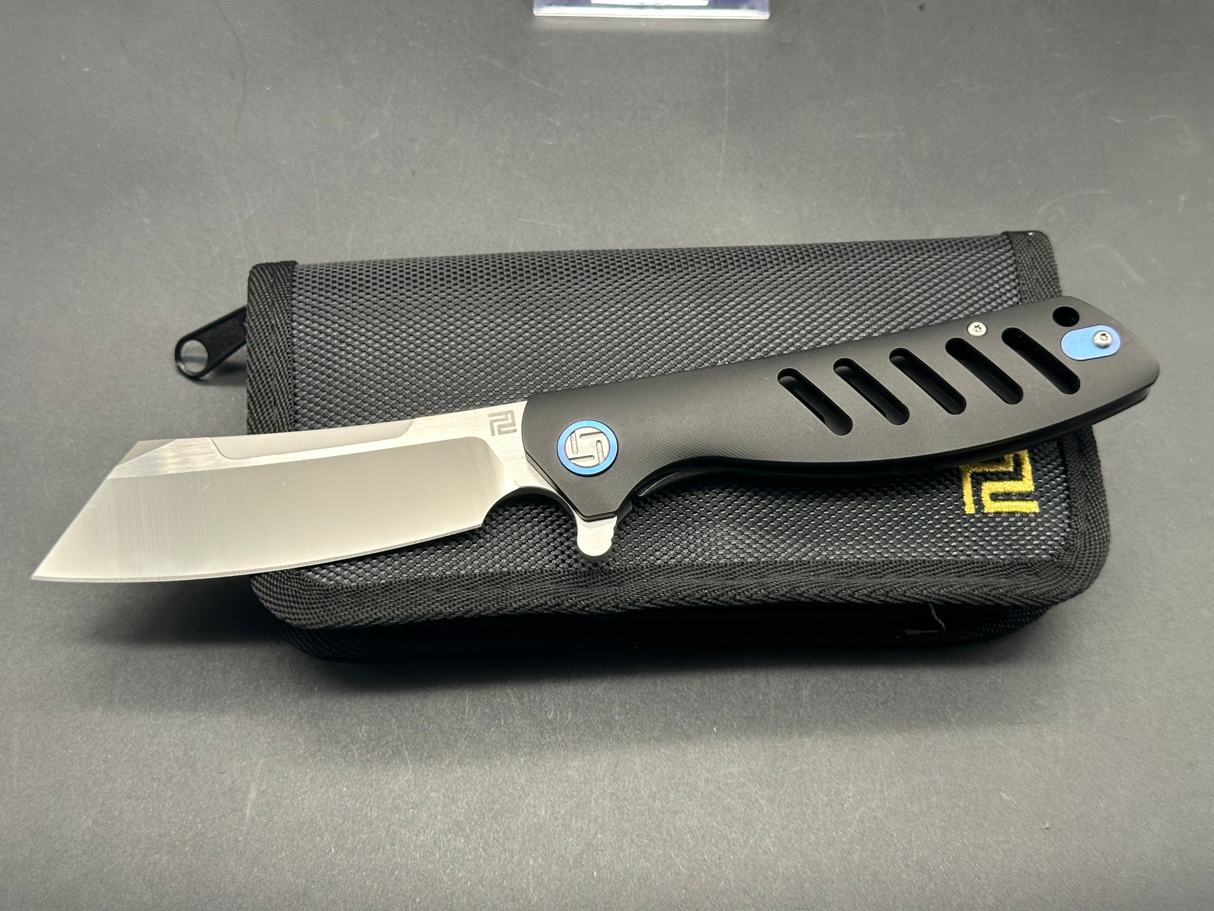 Artisan Cutlery 1815G-BKM "Tomahawk" M390 3.8" Wharncliffe Satin Blade, Black TI Frame, Blue Pivot, LNIB. Never used, carried, or modified. As from the factory w/BOX, Pouch, Tin, spec. card.  $150