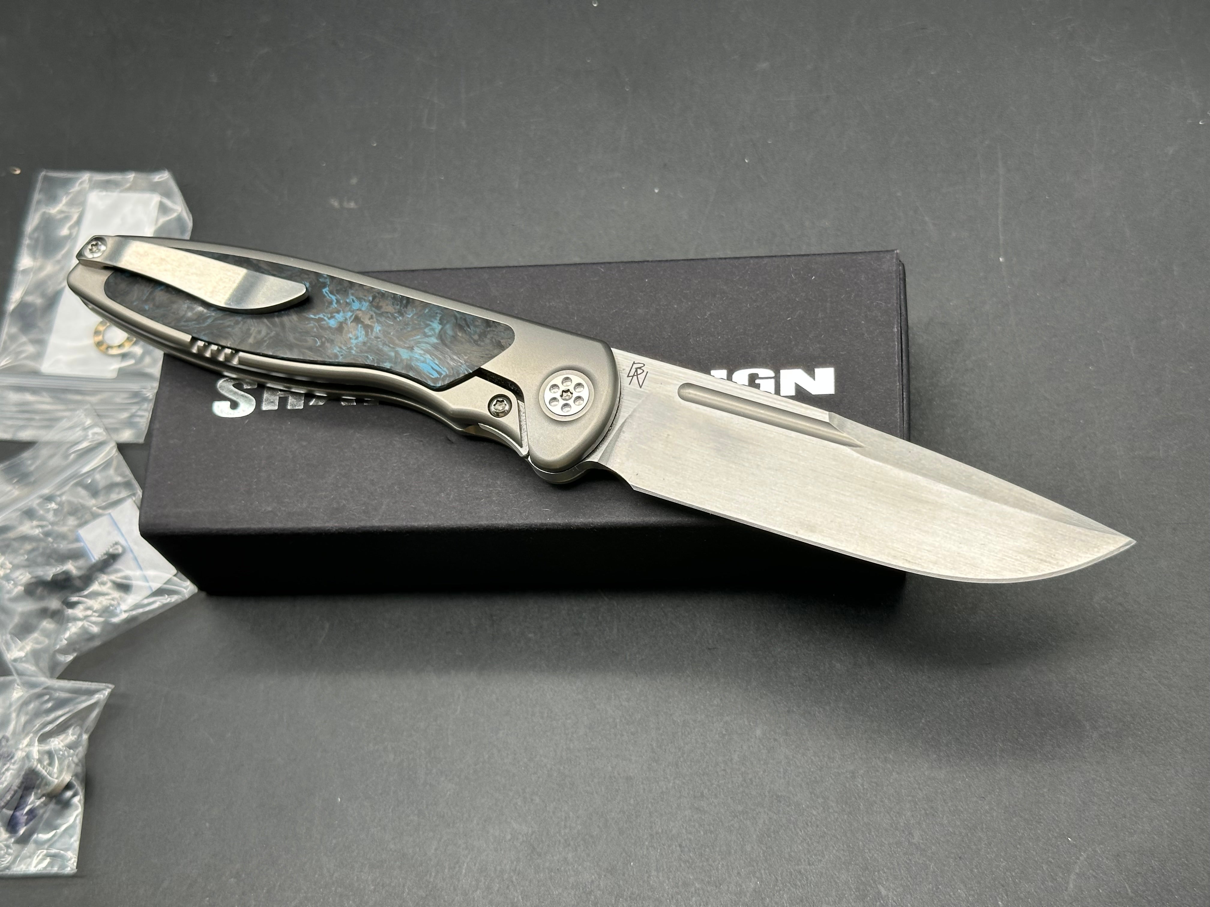 Sharp by Design, Mini Tempest, drop point, blue fat carbon, Skiff bearings