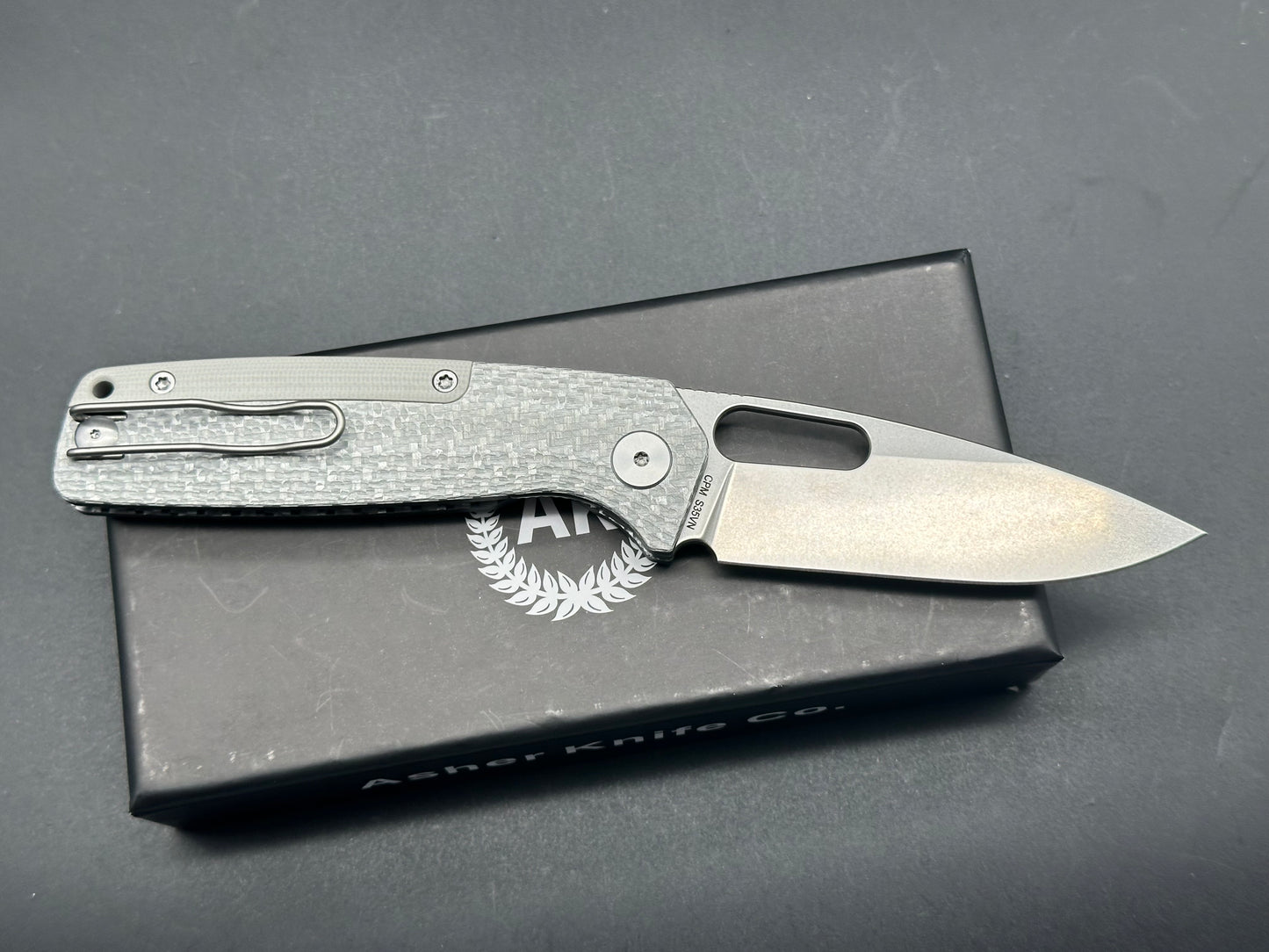 Asher Spiro Silver SS, 3.2" S35VN Blade with SIlver Twill Carbon Fiber and G10 Spacer Handle