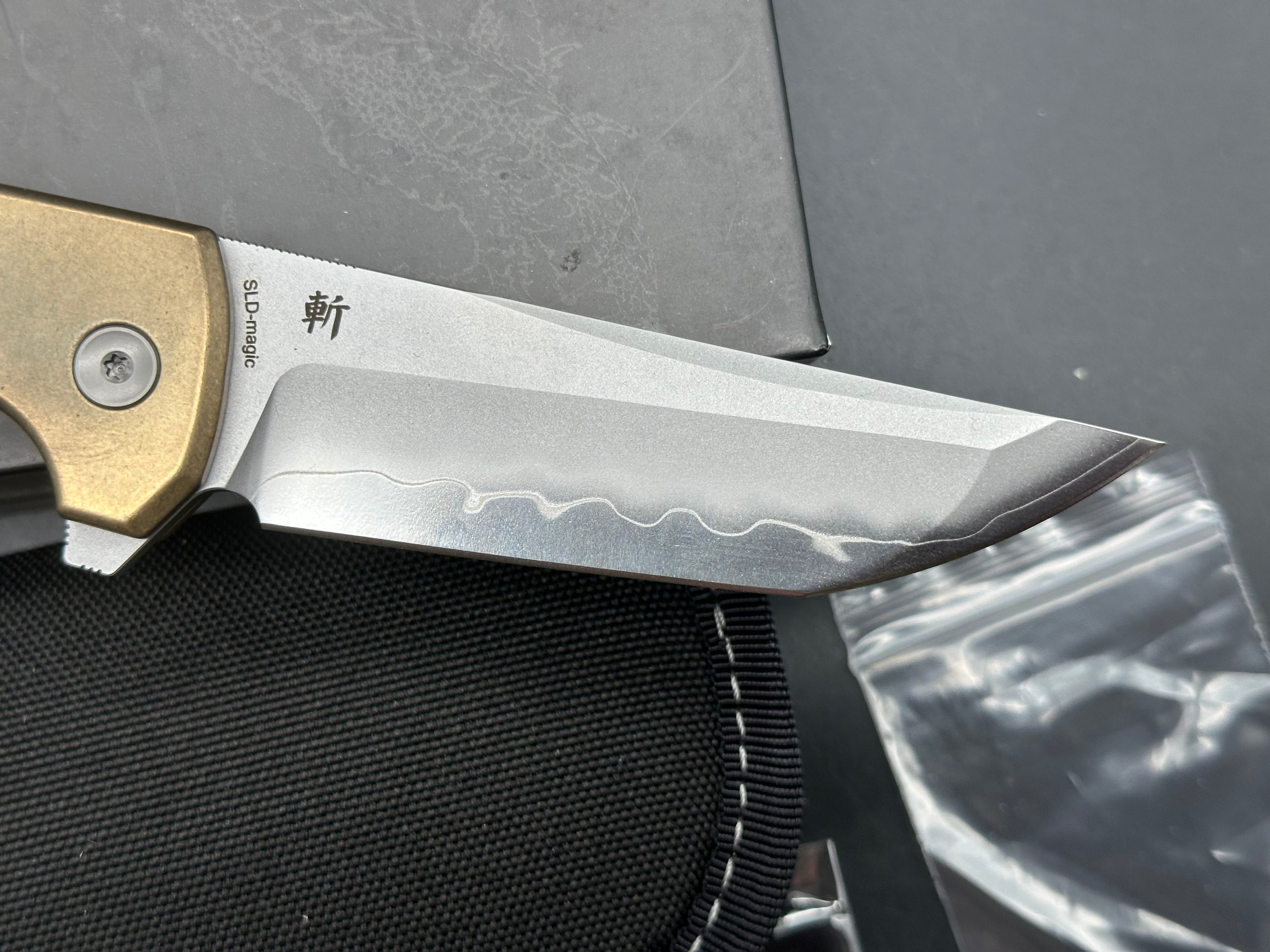 North Mountain Blade Chop 2 Button Lock Flipper Knife 3.5" SLD Hamon Drop Point Blade, Aluminum Bronze Handles with Speed Holes
