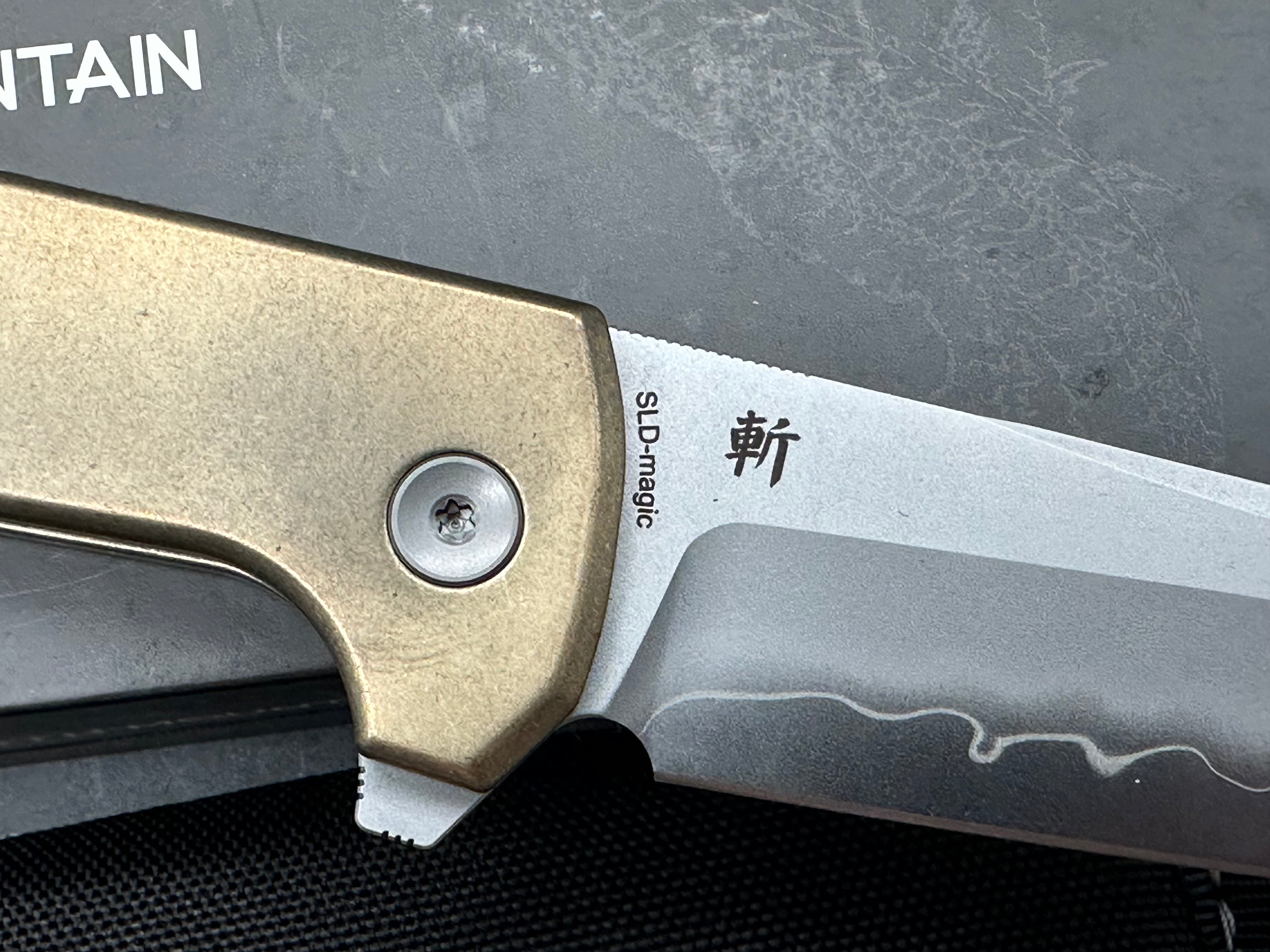 North Mountain Blade Chop 2 Button Lock Flipper Knife 3.5" SLD Hamon Drop Point Blade, Aluminum Bronze Handles with Speed Holes