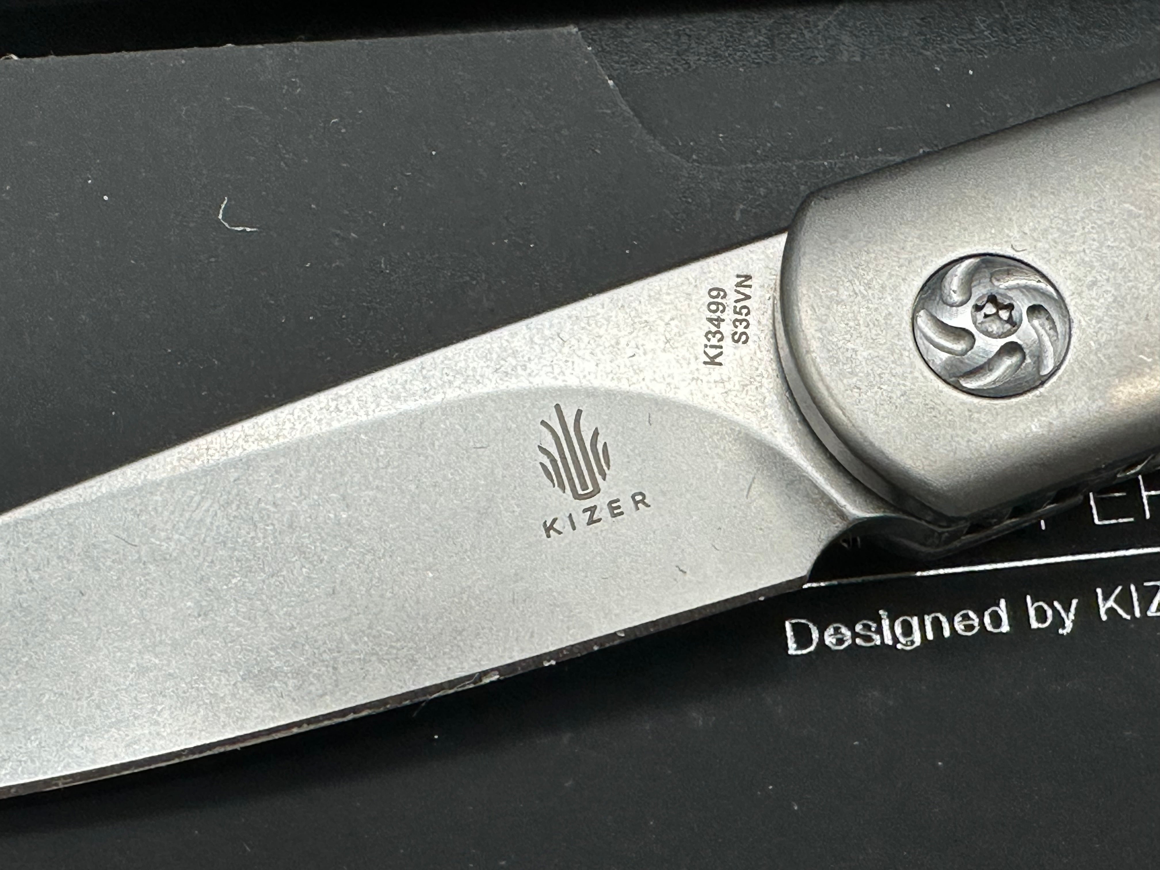 Kizer Feist: Justin Lundquist design. 2.75 inch tumbled CPM-S35VN blade
