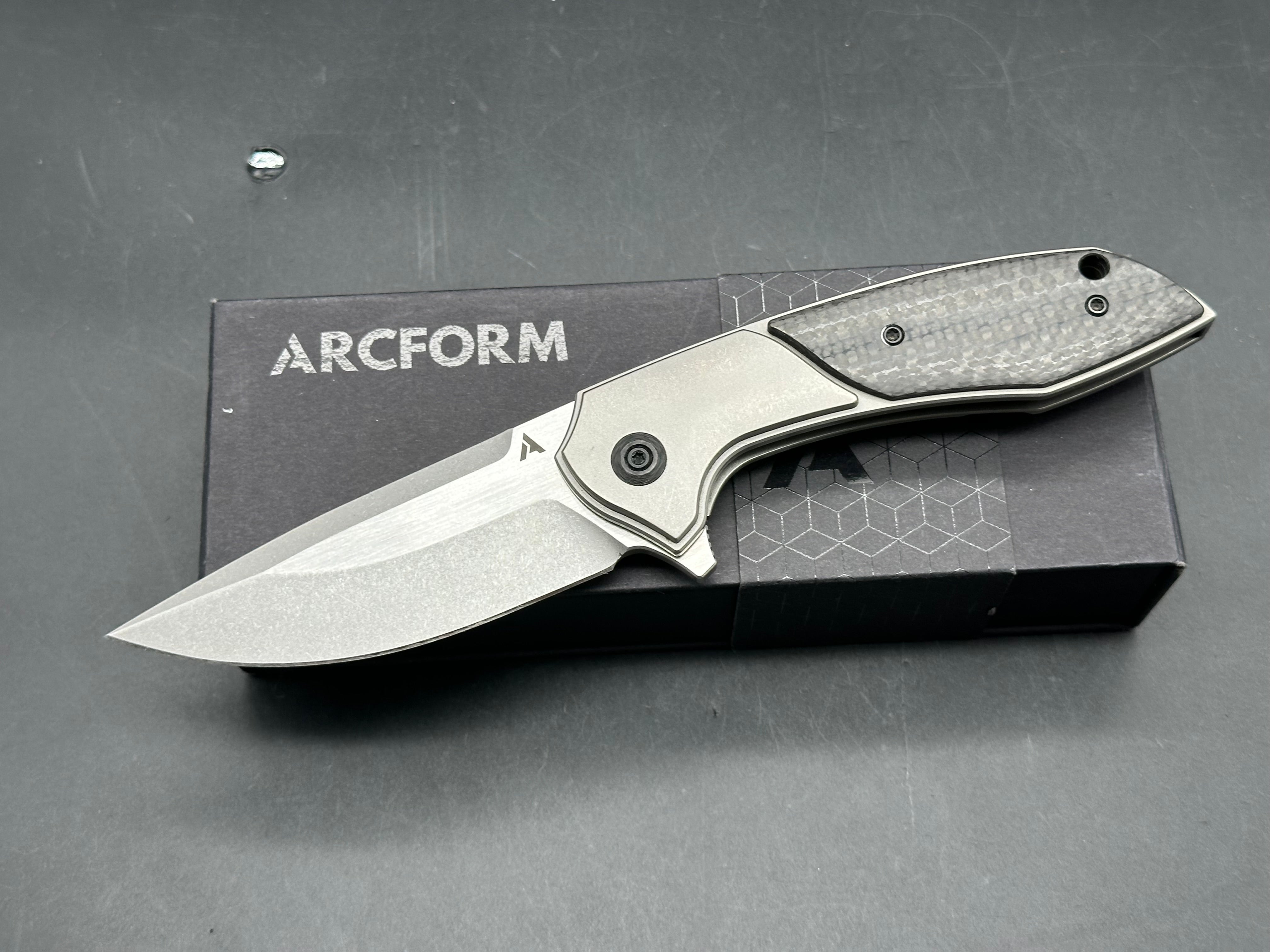 Arcform Catalyst: Geoff Blauvelt design. 3.5 inch  CPM-S35VN blade. Frame lock. Titanium and carbon fiber handle