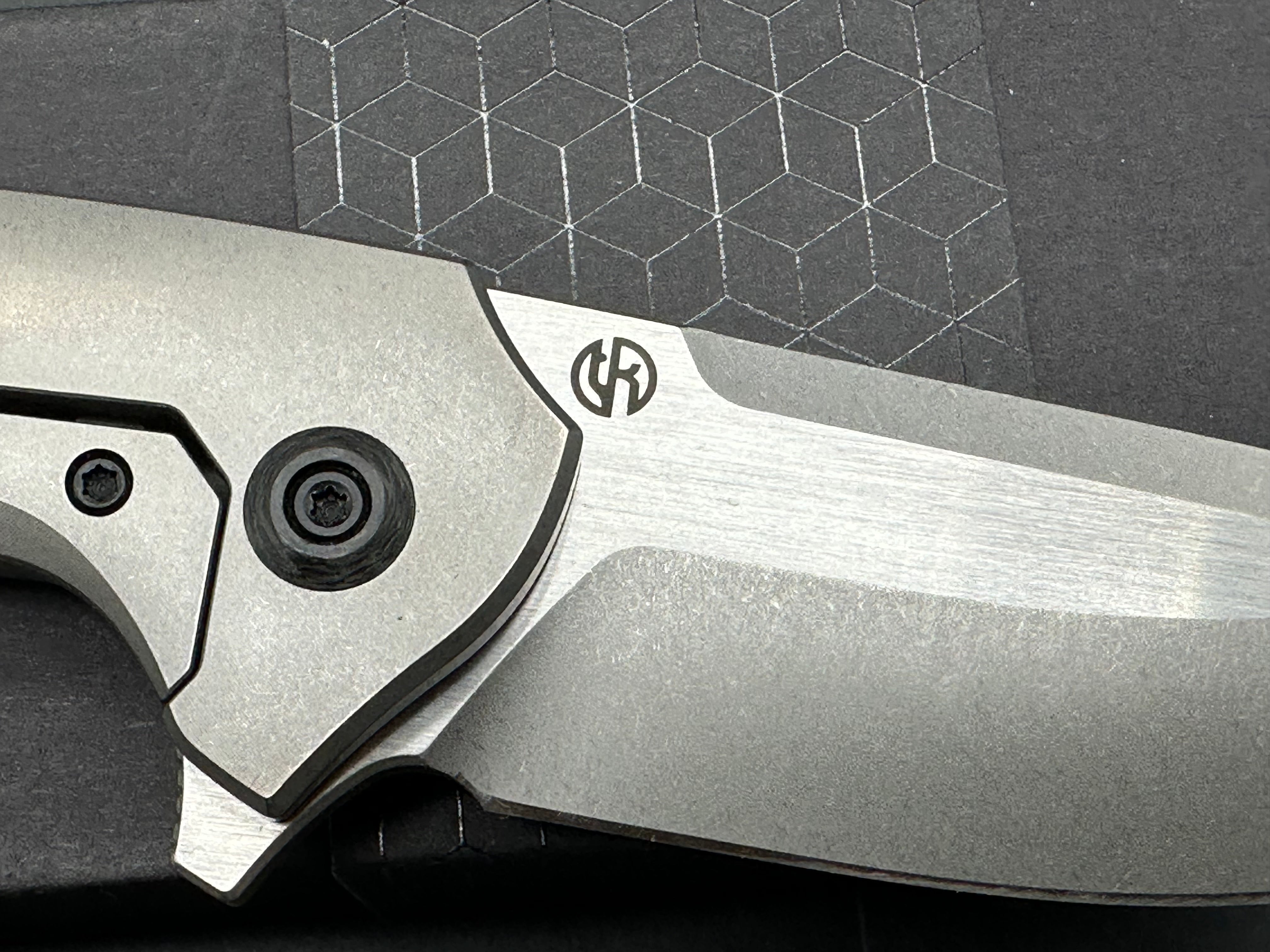 Arcform Catalyst: Geoff Blauvelt design. 3.5 inch  CPM-S35VN blade. Frame lock. Titanium and carbon fiber handle