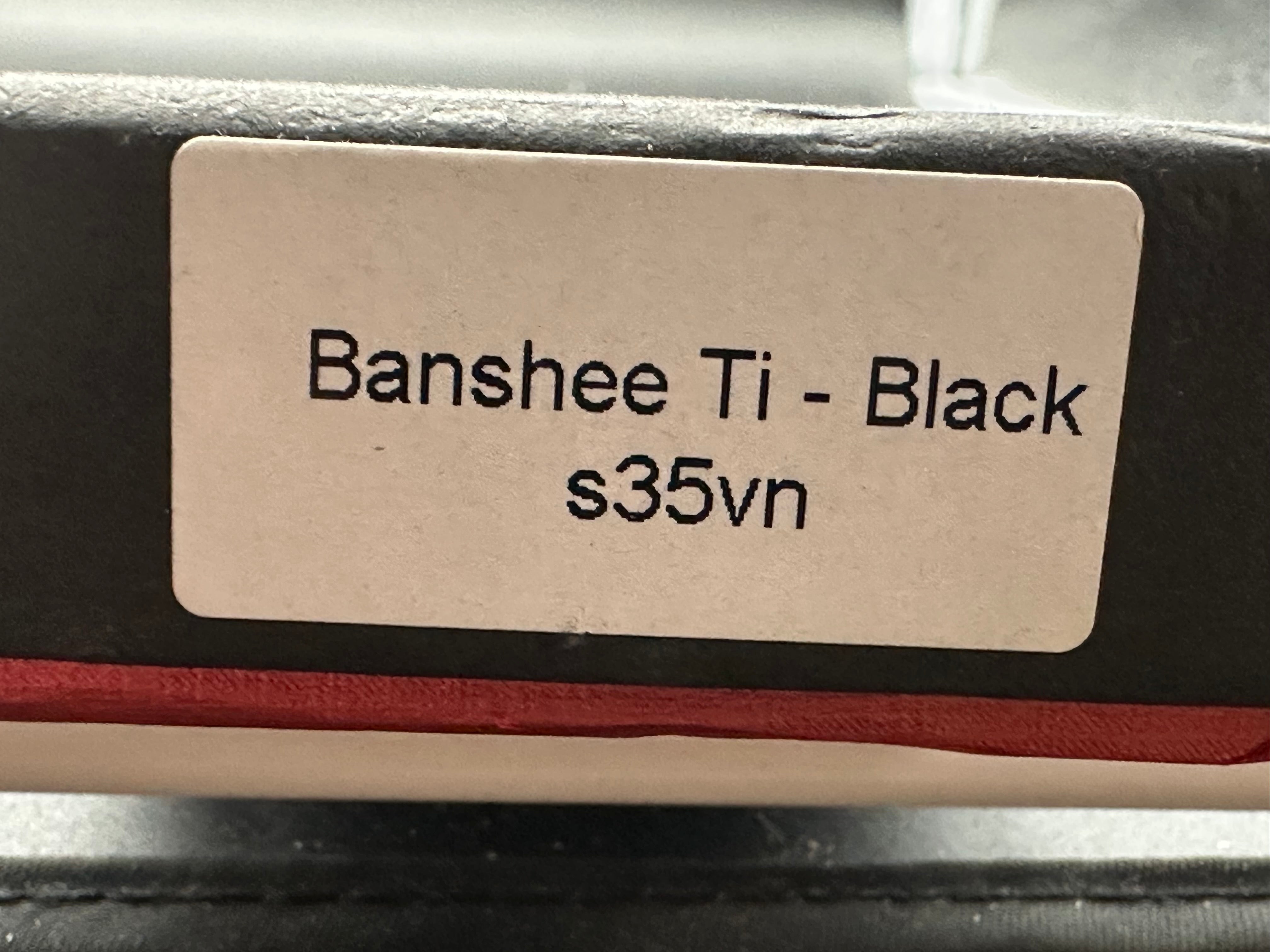 Damned Designs Banshee: 3.1 inch hollow grind, stonewashed, blackwashed CPM-S35VN blade. Ceramic ball bearings