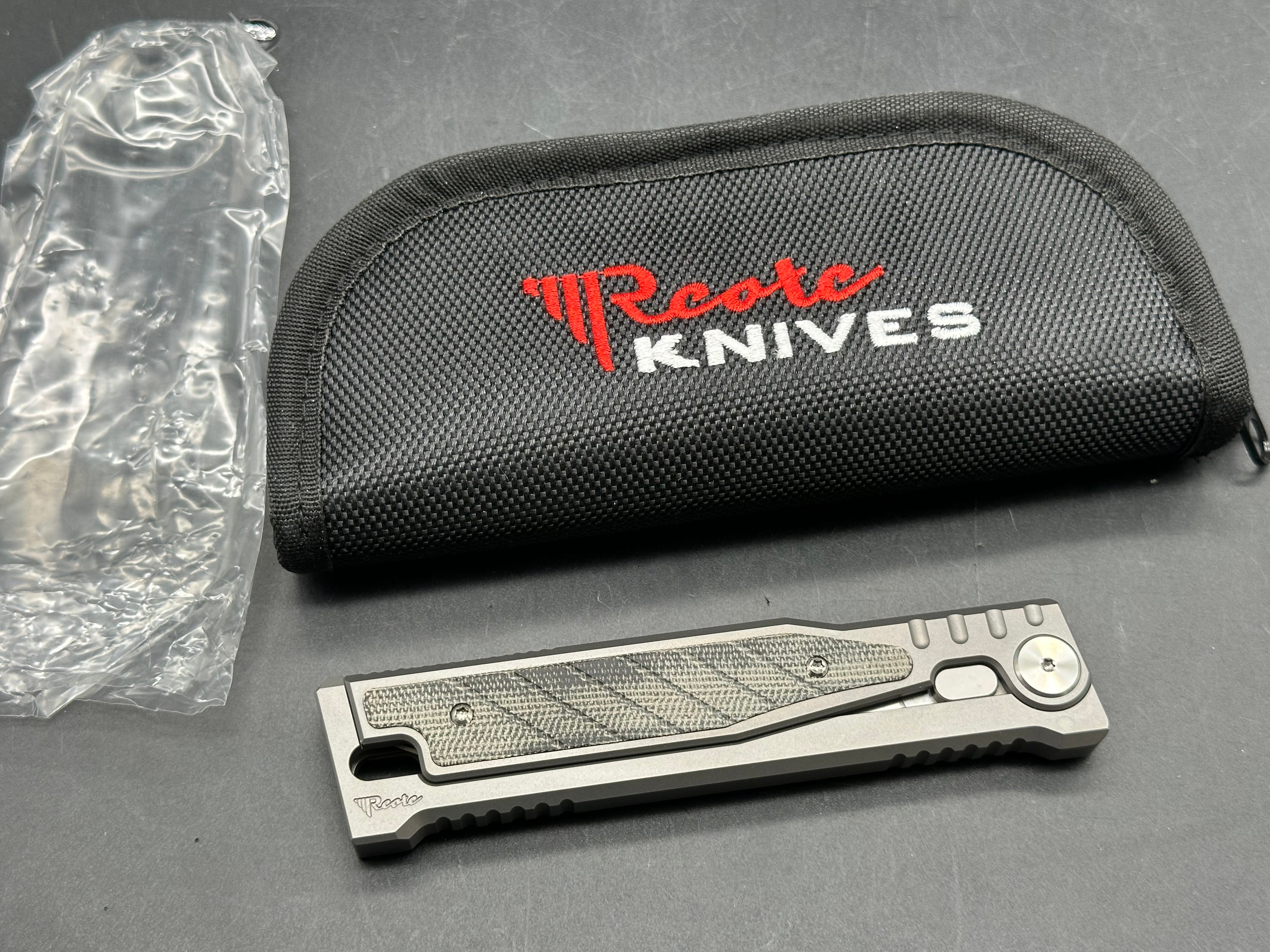 Reate Exo 3.75 inch Elmax gravity drop blade Titanium frame with green micarta inserts