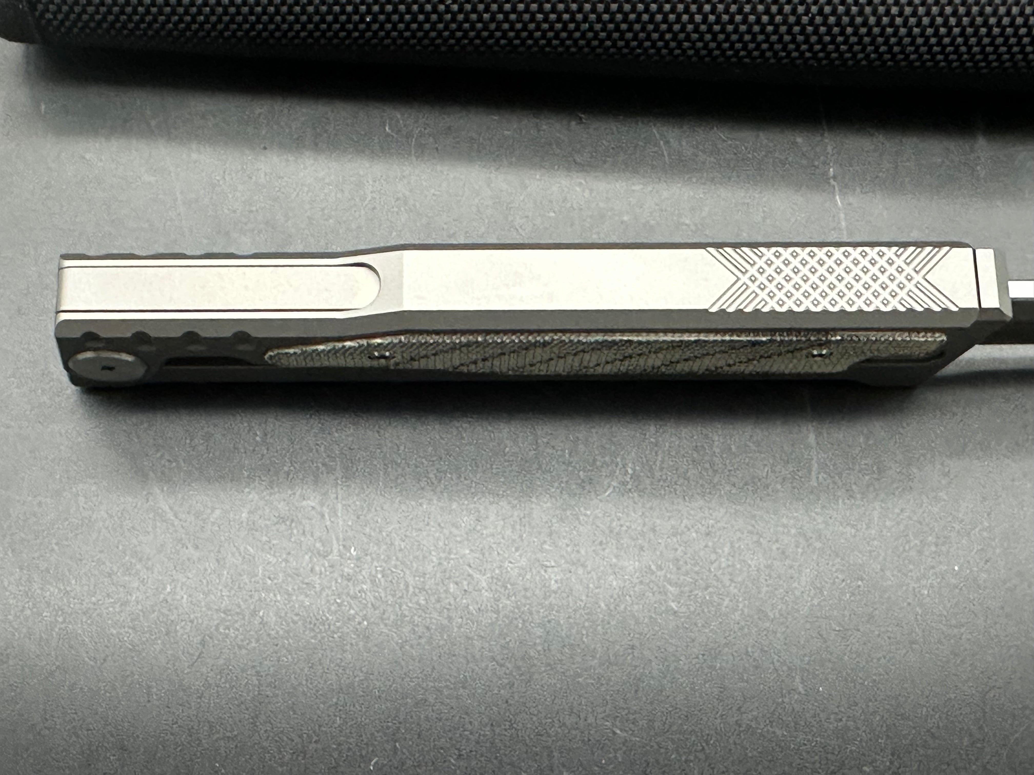 Reate Exo 3.75 inch Elmax gravity drop blade Titanium frame with green micarta inserts