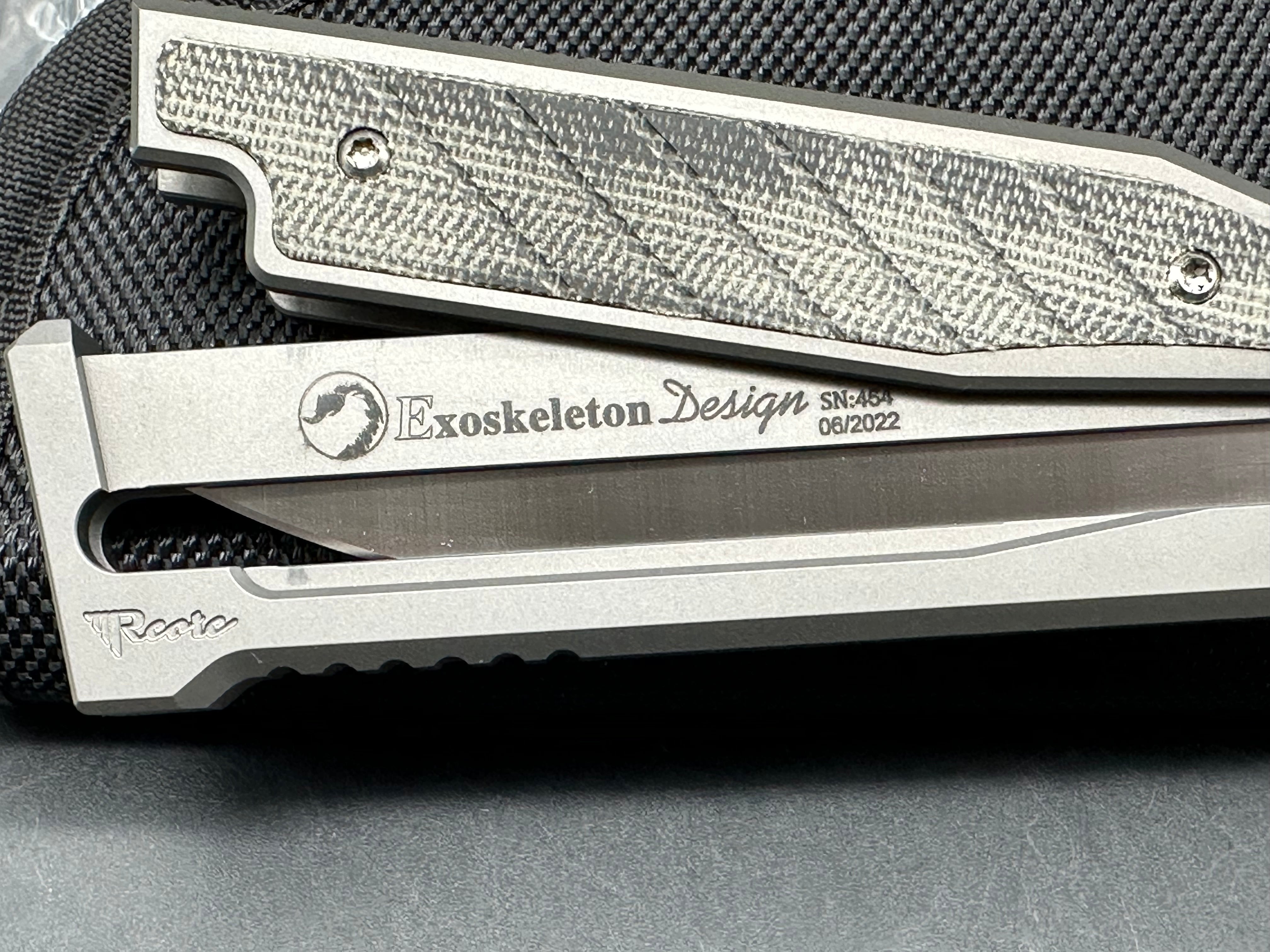 Reate Exo 3.75 inch Elmax gravity drop blade Titanium frame with green micarta inserts