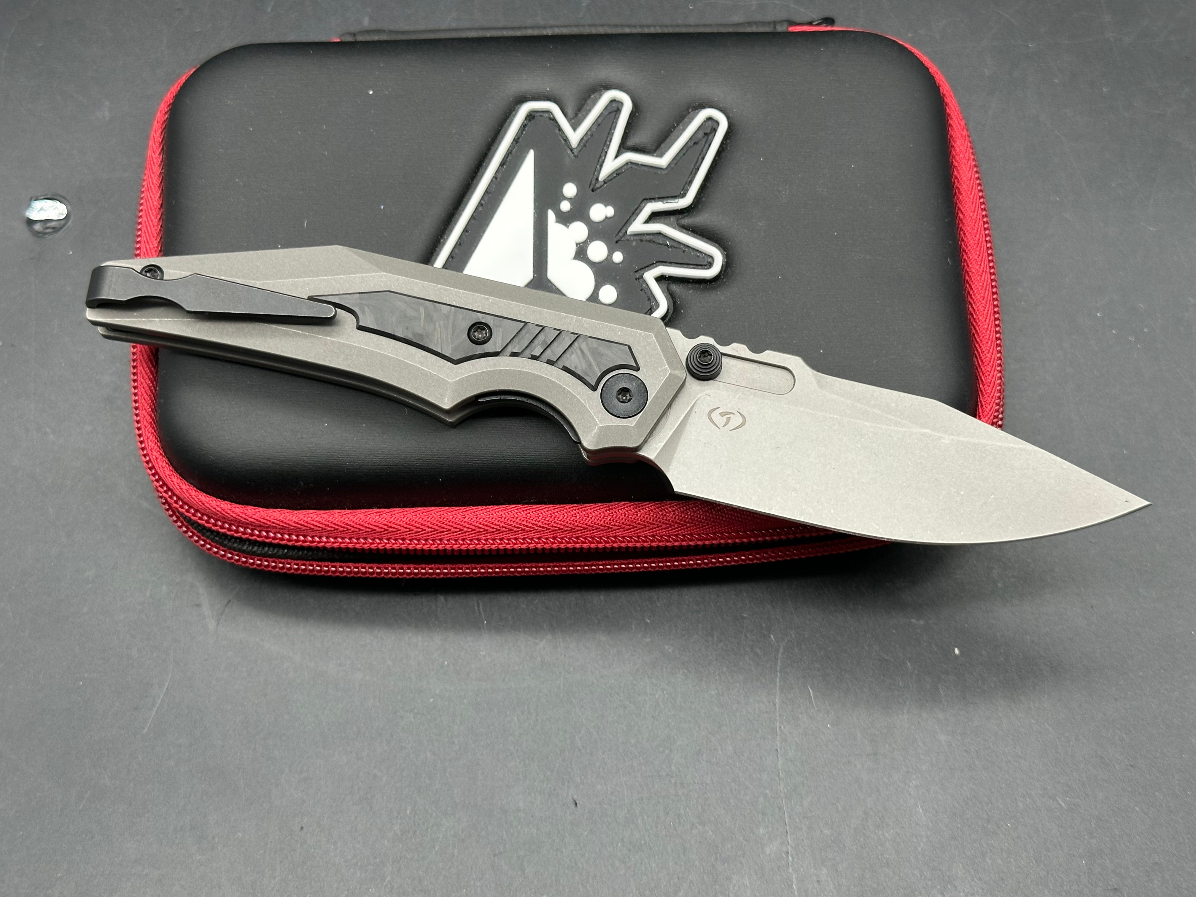 Arcane Designs Preytheon 3.125 inch acid etched, tumbled CPM-20CV blade. Milled and tumbled titanium frame