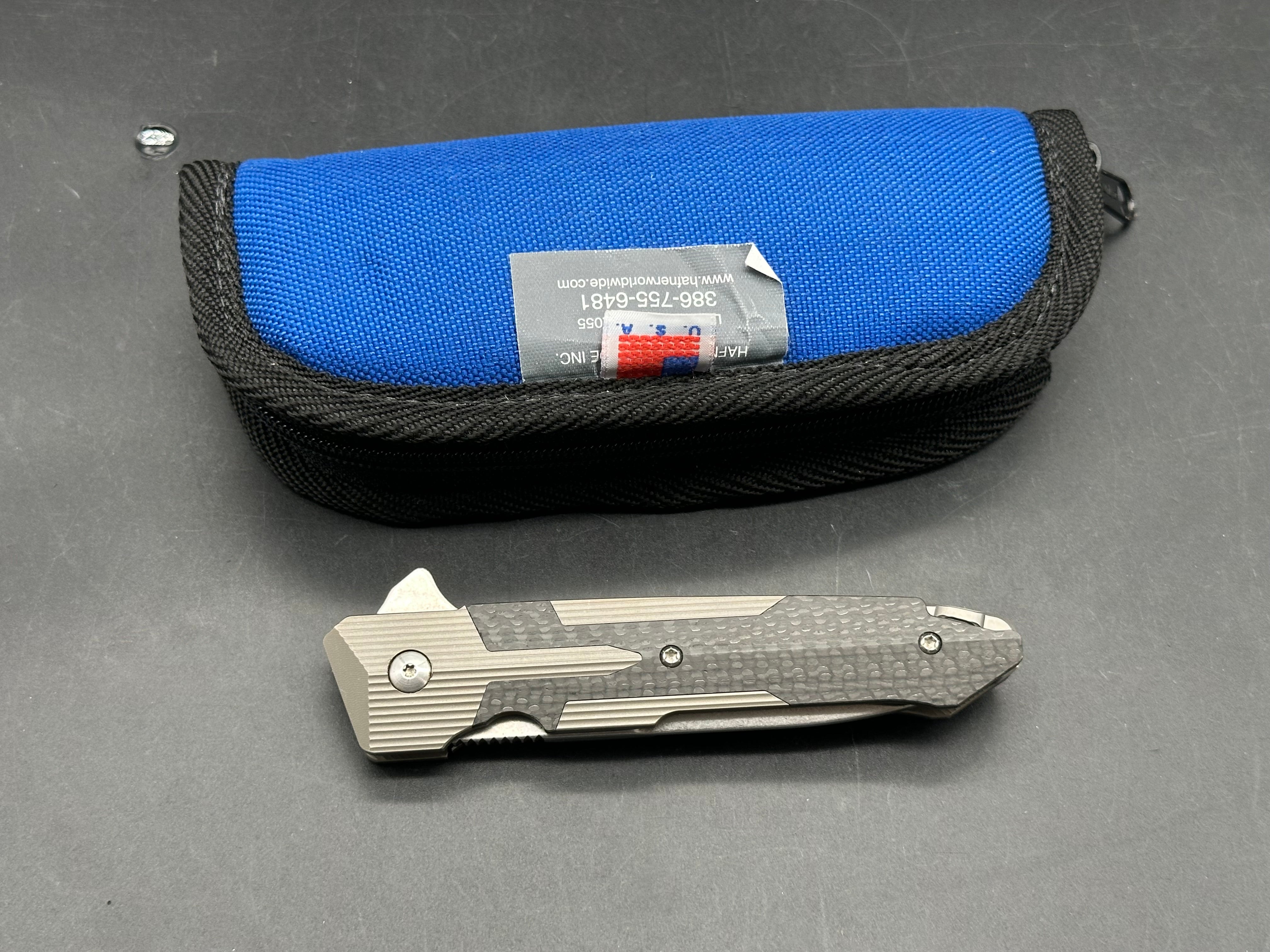 Spartan Blades Kranos 3.375 inch CPM-S35VN blade. Machined titanium handle with Spartan inspired carbon fiber inlays
