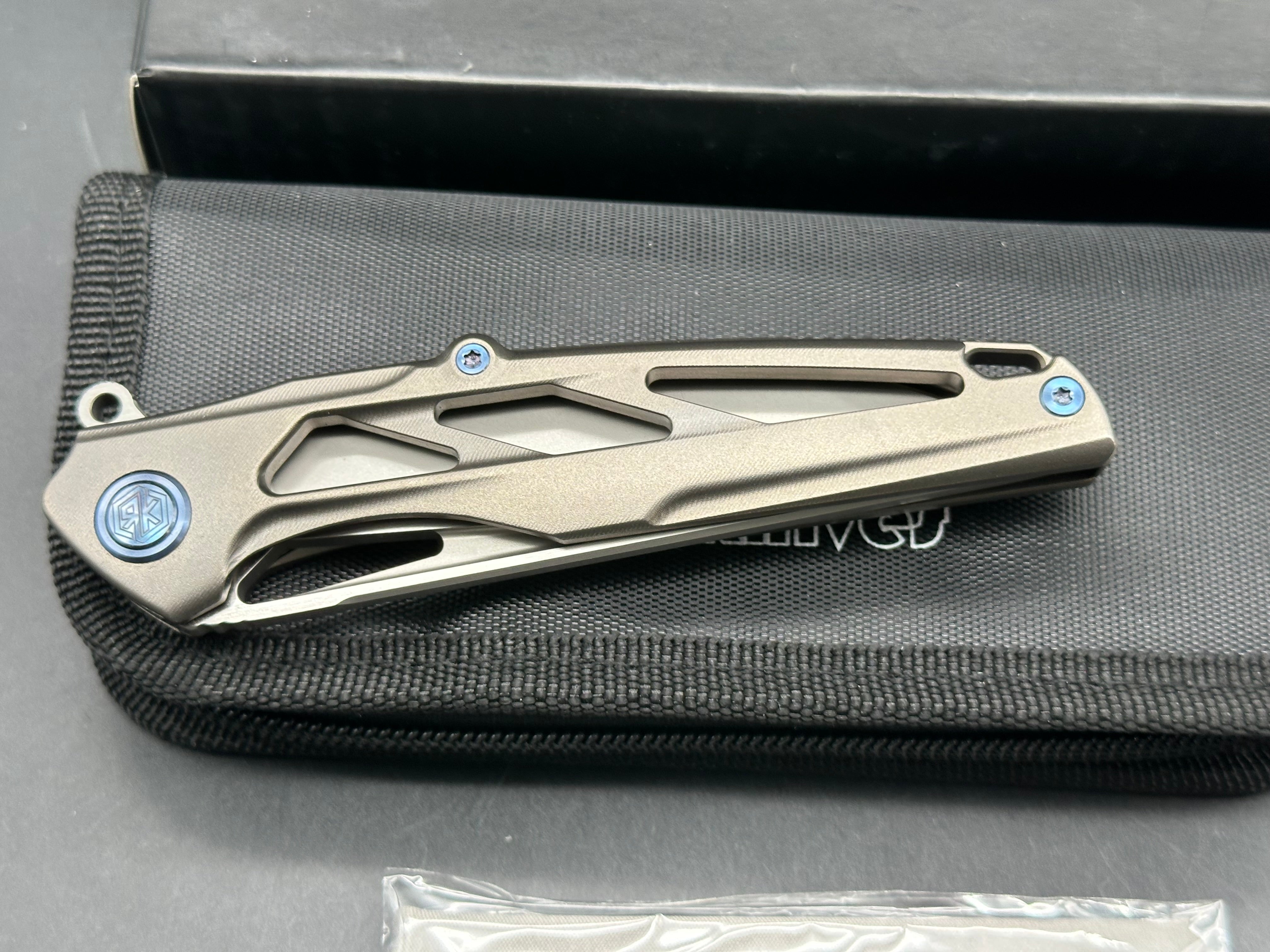 Rike Knives Knight 3.75 inch CPM-N690 tumbled, two tone blade. Titanium handle