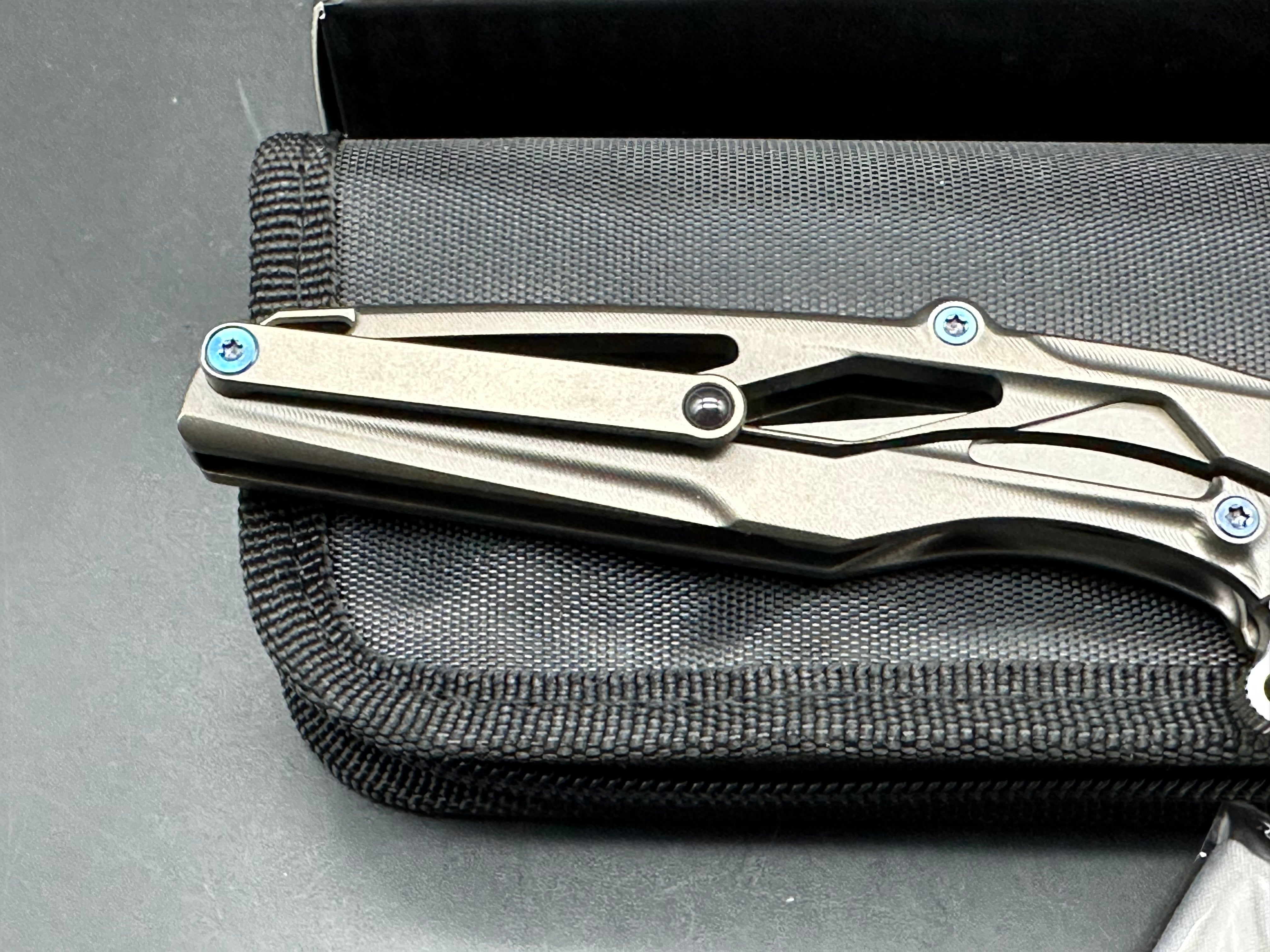 Rike Knives Knight 3.75 inch CPM-N690 tumbled, two tone blade. Titanium handle