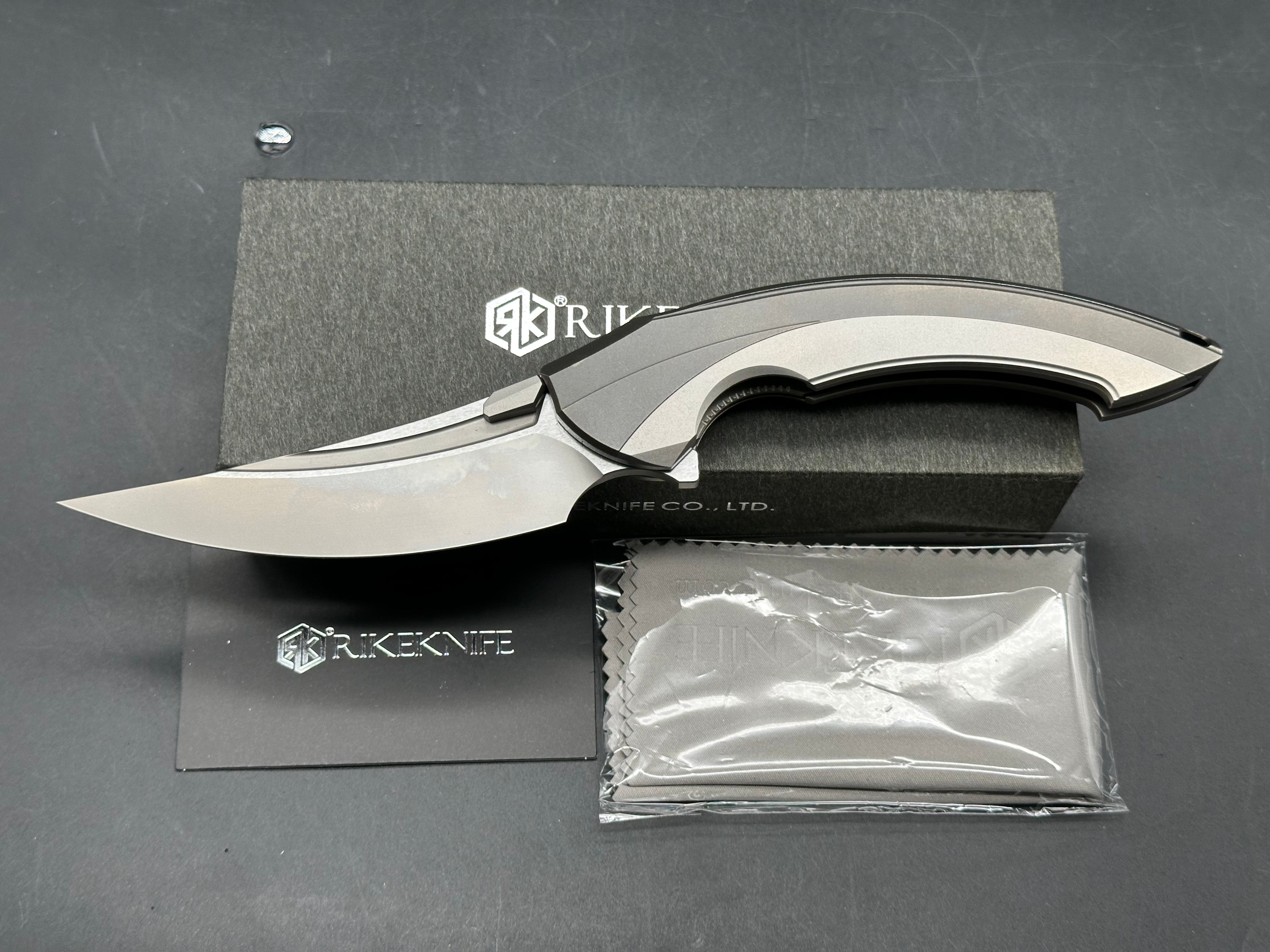 Rike Knives Lamella 3.75 inch CPM-20CV two tone blade with fullers. Titanium pseudo integral frame and liner