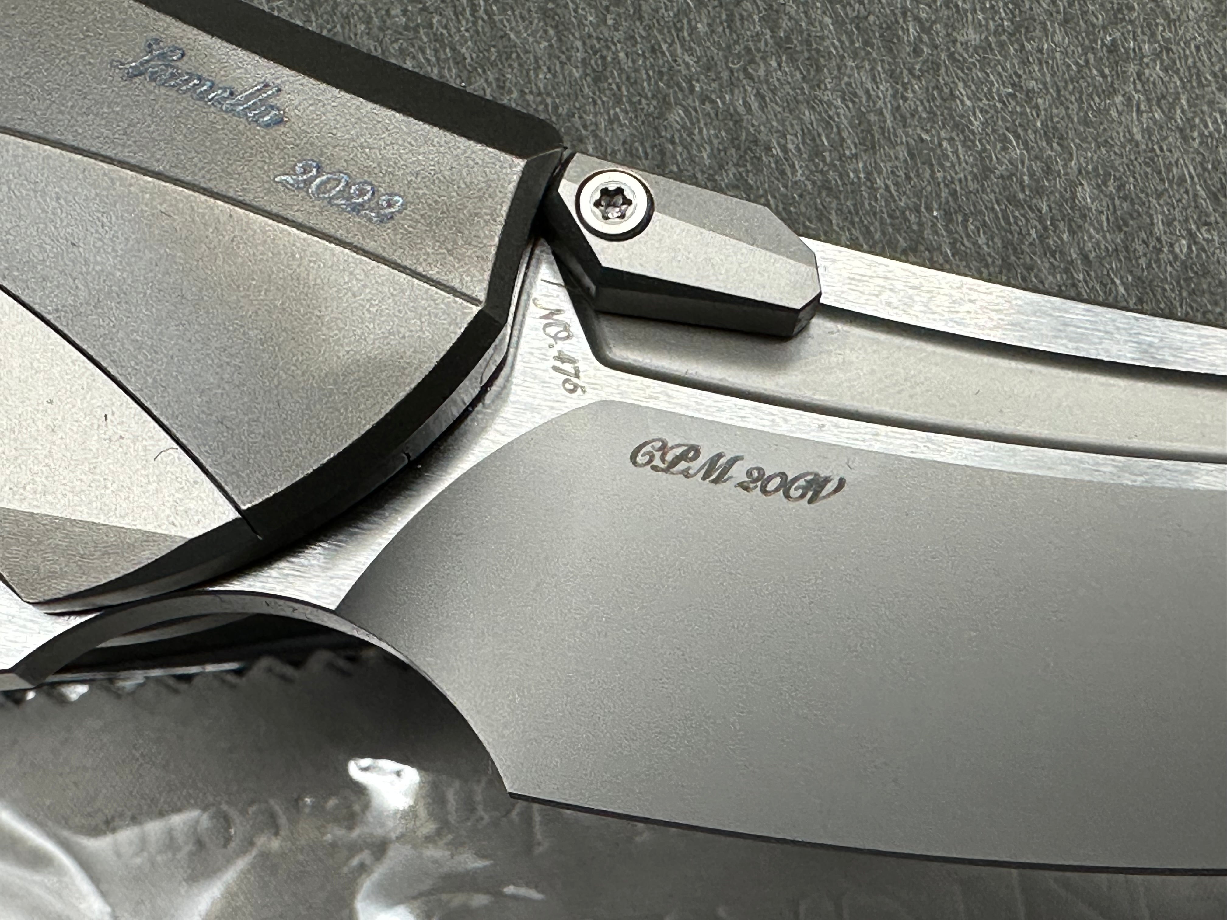 Rike Knives Lamella 3.75 inch CPM-20CV two tone blade with fullers. Titanium pseudo integral frame and liner