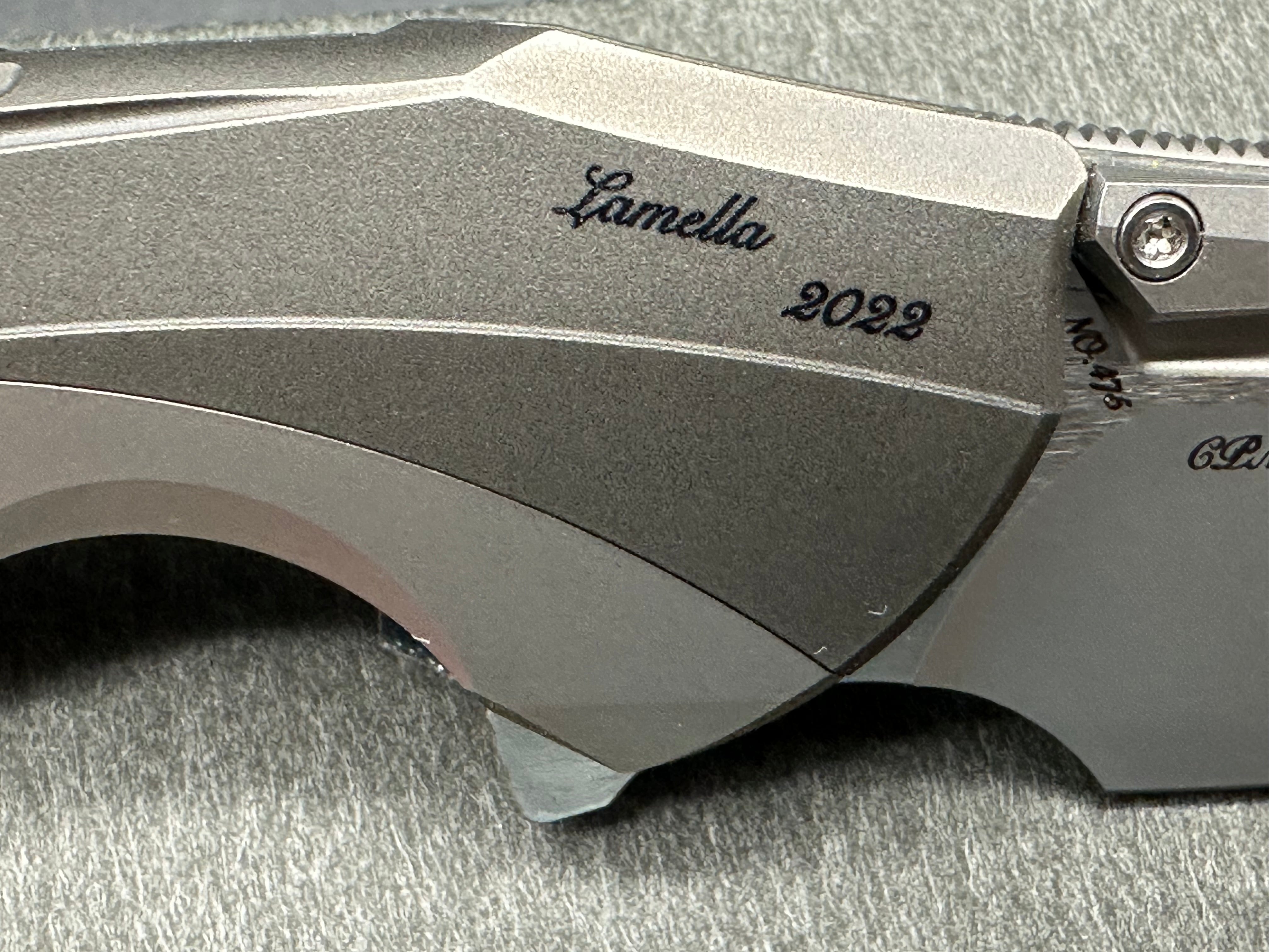 Rike Knives Lamella 3.75 inch CPM-20CV two tone blade with fullers. Titanium pseudo integral frame and liner