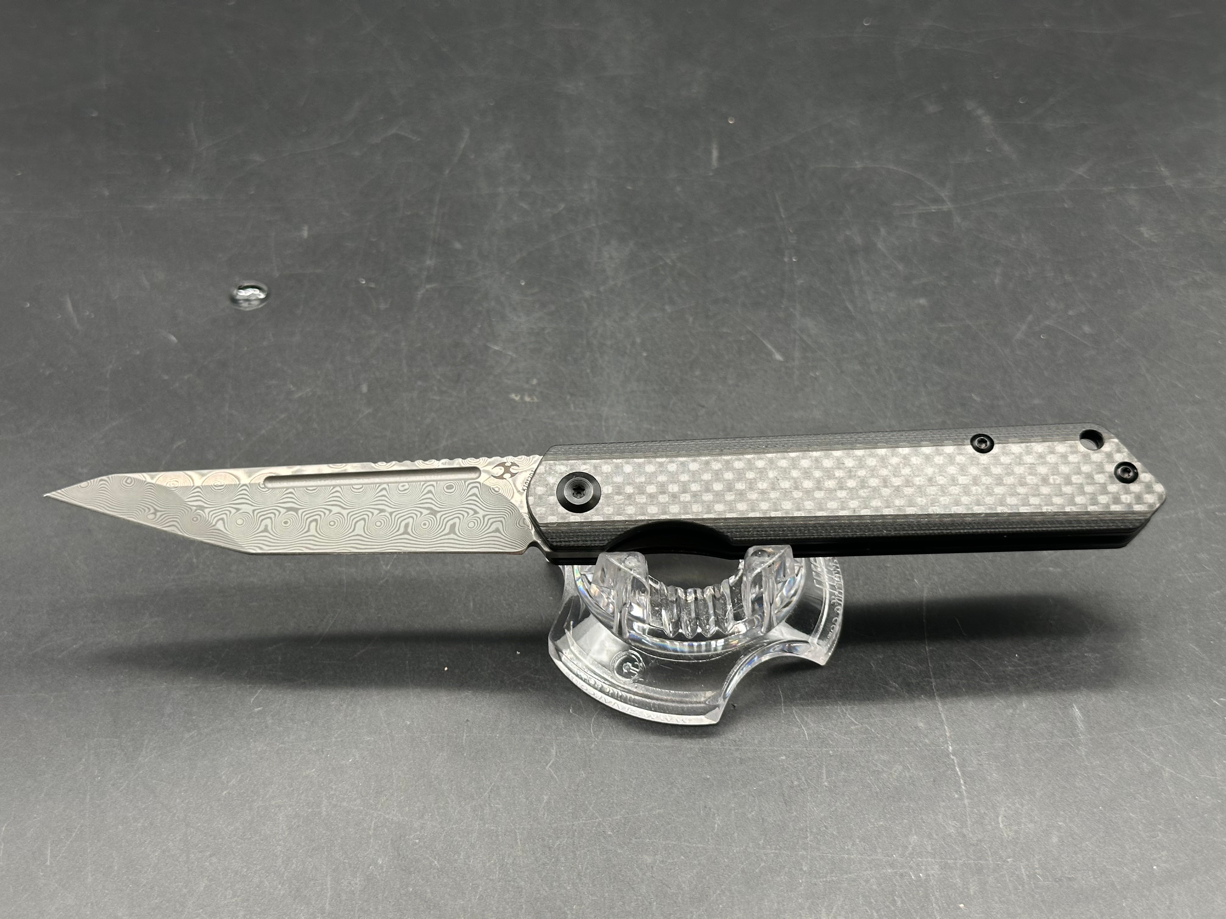 Kansept Prickle 3.5 inch Damascus blade. Carbon fiber scales